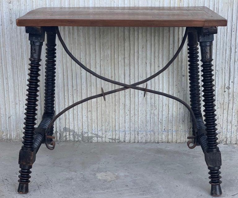 19th century Baroque Spanish side table with marquetry top

19th century Spanish trestle table in walnut. This piece has a great scale, lovely turned legs and beautiful marquetry top. This table could be used as an end table, nightstand, side