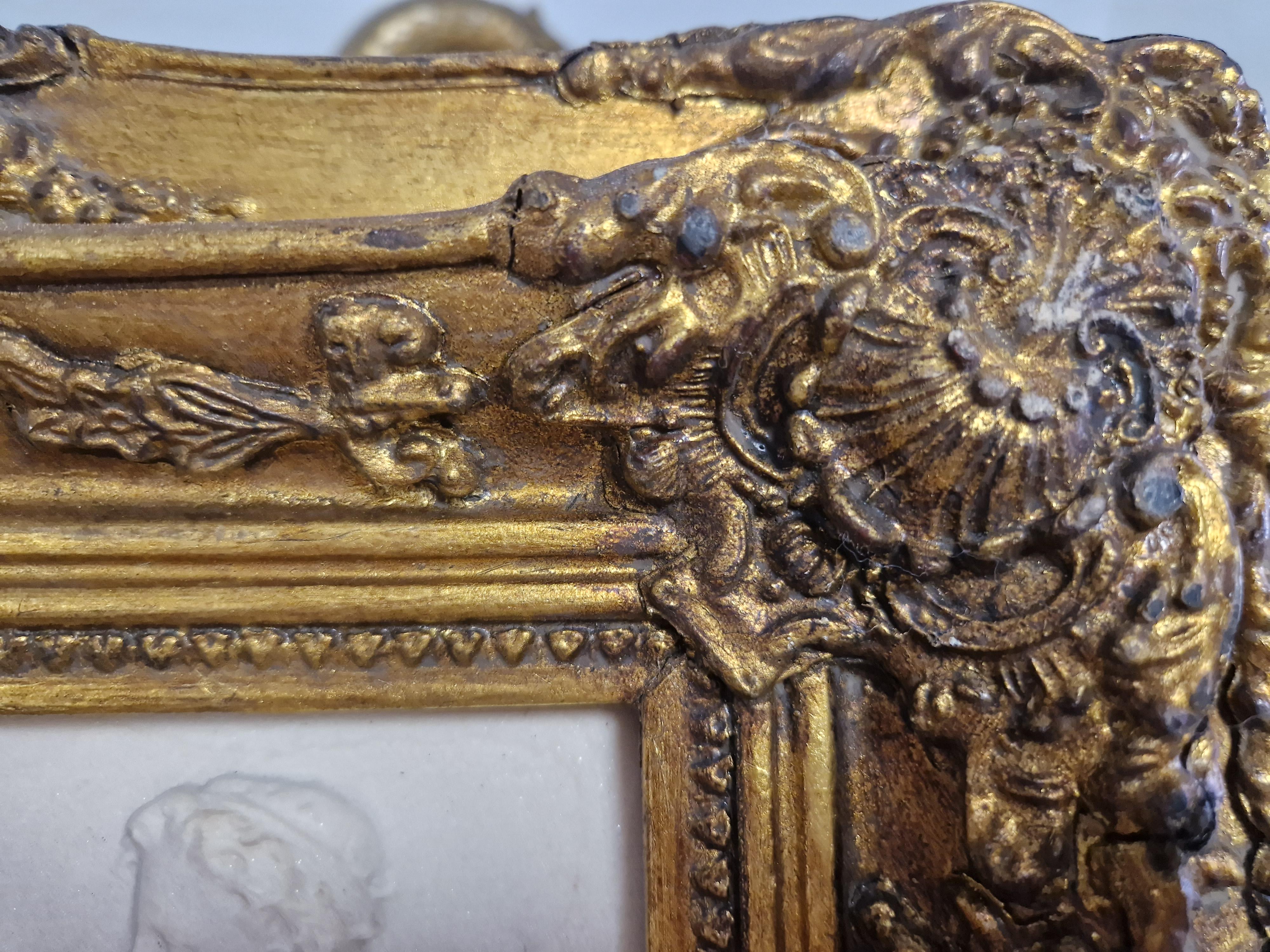Hand-Carved 19th Century Bas Relief in Gilt Rococo Frame For Sale