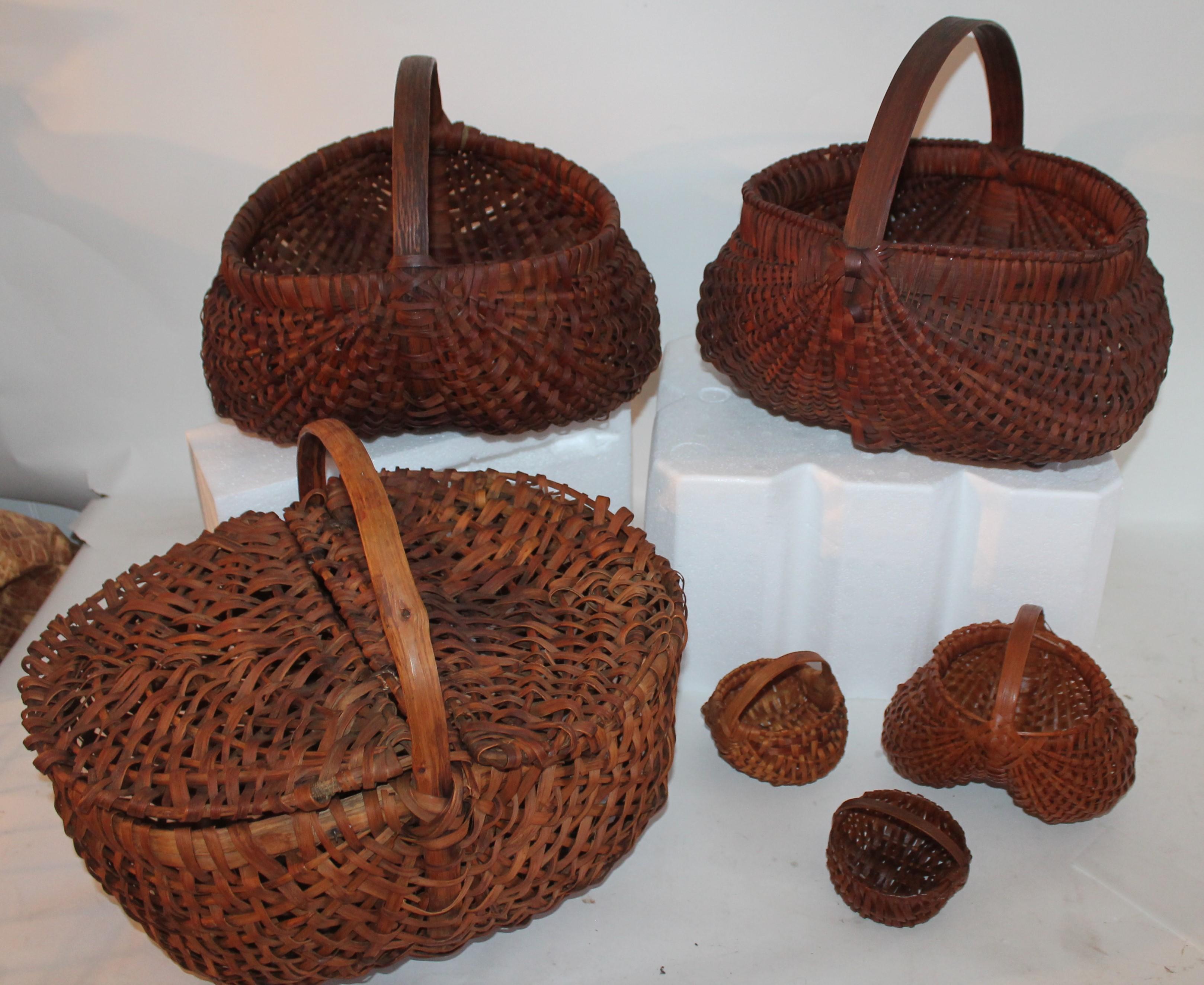 This group of finely woven hiney baskets are in really good condition. It is being sold as one group or collection. All baskets are in very good condition as found in collectors house. From tiny sizes to large sizes. The two top baskets are as