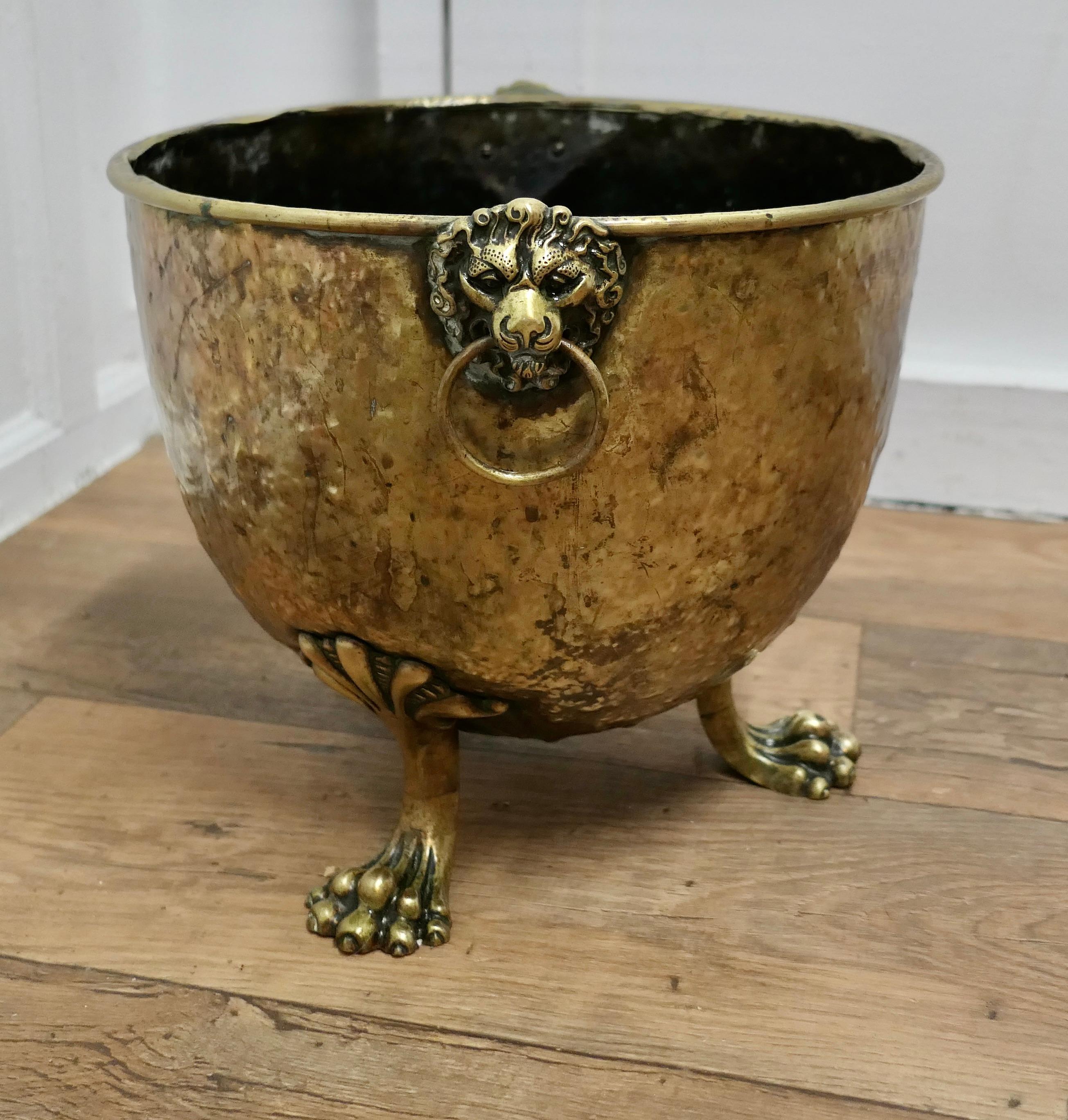 Arts and Crafts 19th Century Beaten Brass Lions Mask Log Bin/ Planter For Sale