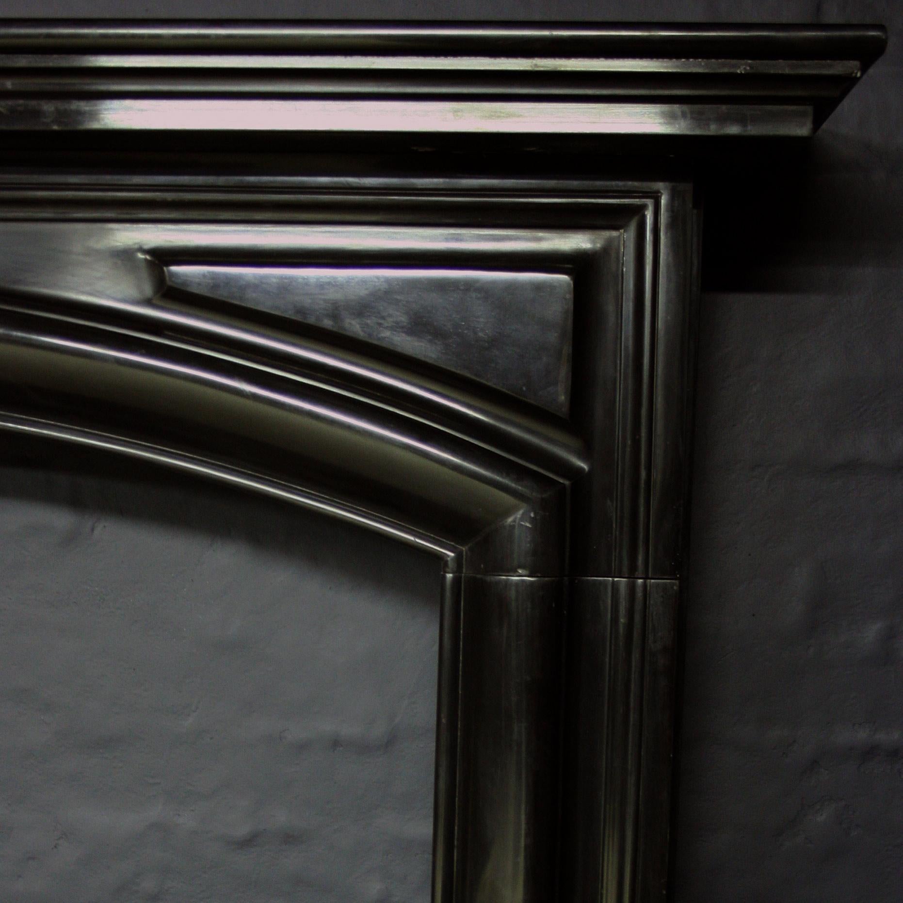 Carved 19th Century Belgian Black Marble Chimneypiece For Sale