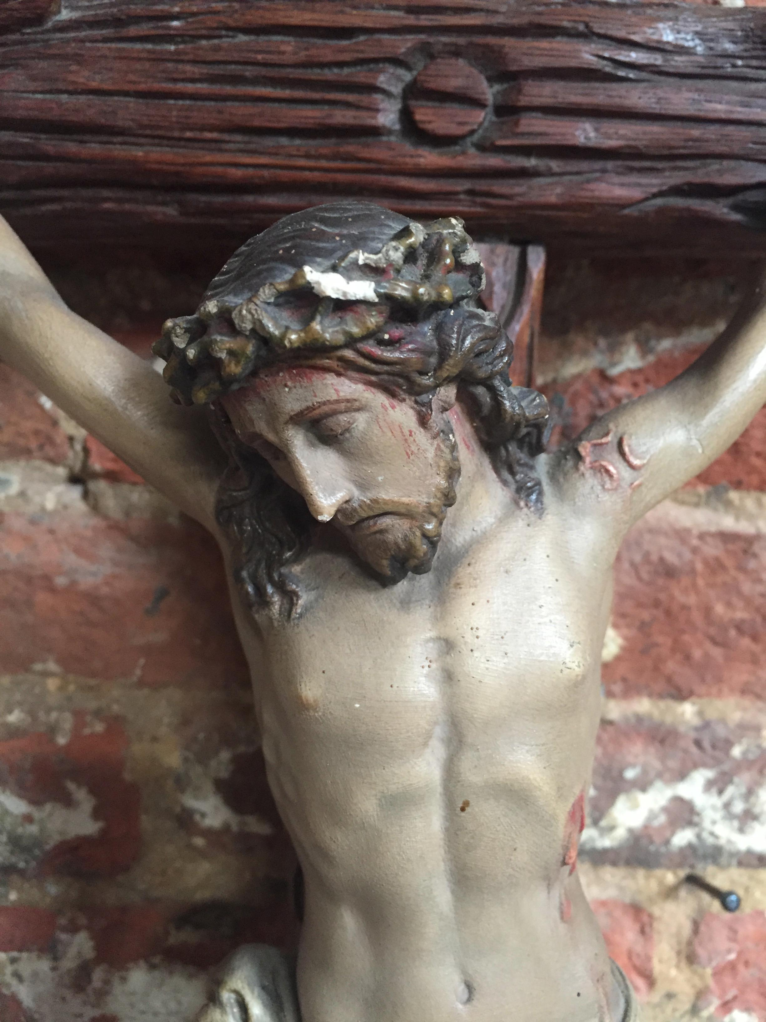Late 19th century Belgian crucifix from De Dames Institute in Antwerp Belgium.
The cross is carved oakwood and Jesus is cast from plaster and hand painted.