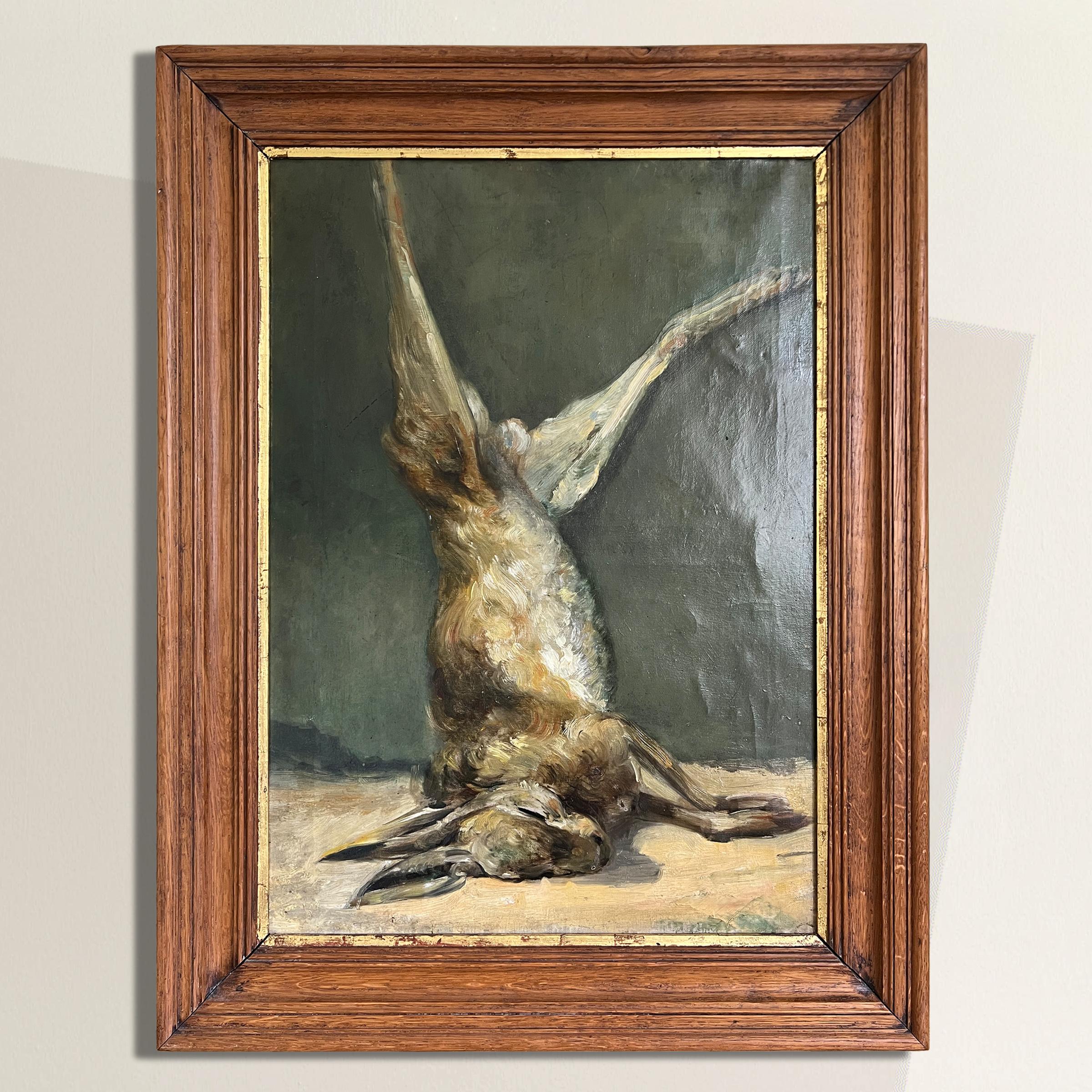 Une étonnante nature morte belge à l'huile sur lin du XIXe siècle représentant un trophée de chasse au lièvre, avec une incroyable attention aux détails, y compris l'attrait tactile de la fourrure du lièvre. La chasse était l'un des principaux