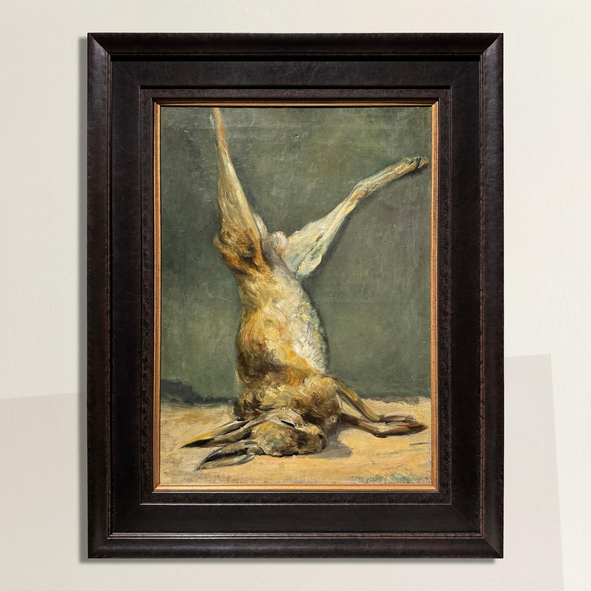This bold 19th-century Belgian hunting still life captures a single hare, suspended from one leg, its body resting naturally on a surface below. Painted in an impressionistic style with confident, expressive brushstrokes, the hare’s coat is rendered