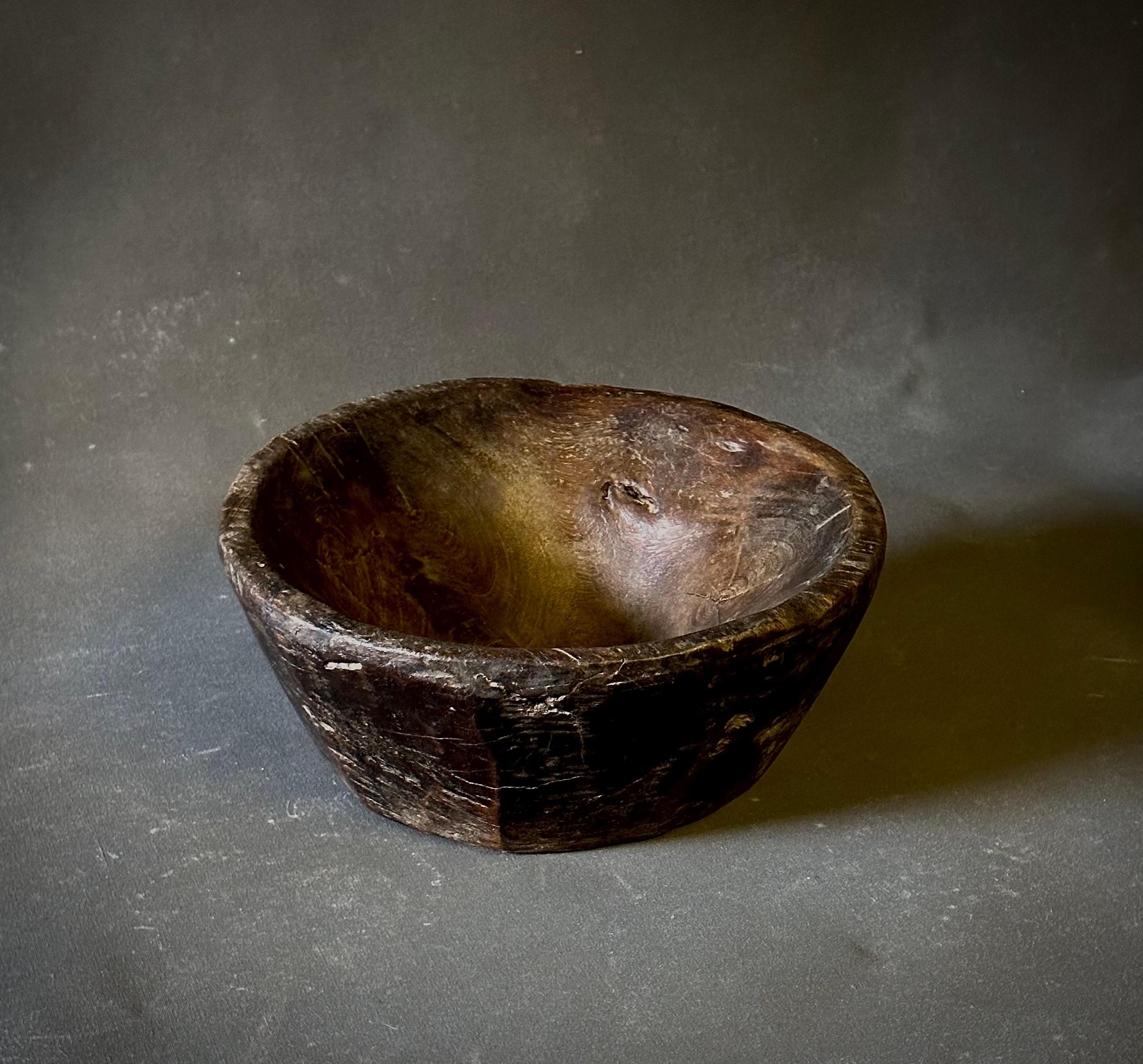 Rustic 19th century hand-carved wooden bowl. Excellent as a serving bowl or accent piece with its handsome proportions and earthen appeal. 

Belgium, circa 1860

Dimensions: 11.5 W x 11.5 D x 5 H.