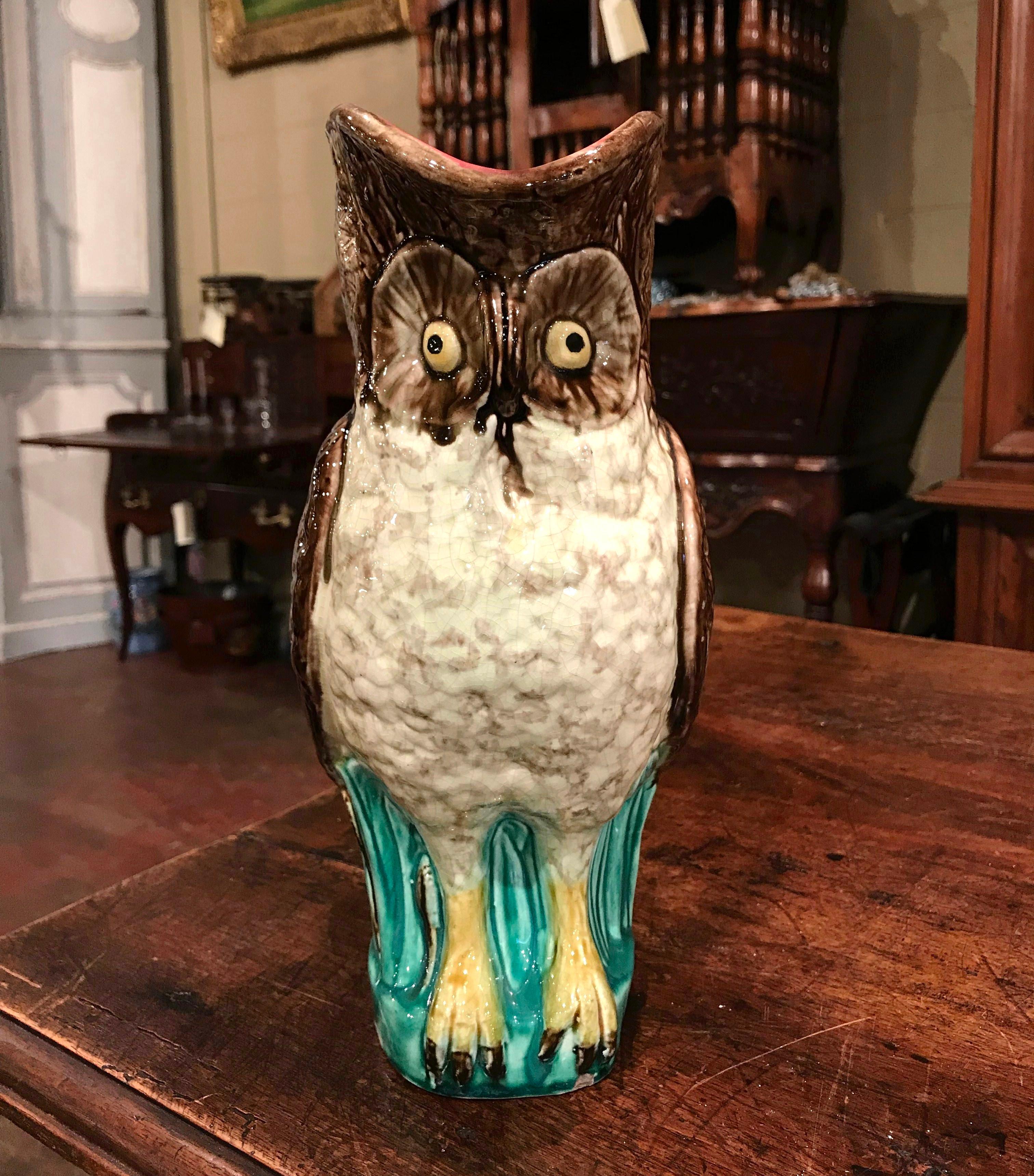 Porcelain collectors will love this whimsical antique owl pitcher. Crafted in Nimy-les-Mons, circa 1890, the large ceramic vase from Belgium is an excellent example of the painterly artistry of Barbotine porcelain pieces. The fun, unique pitcher is