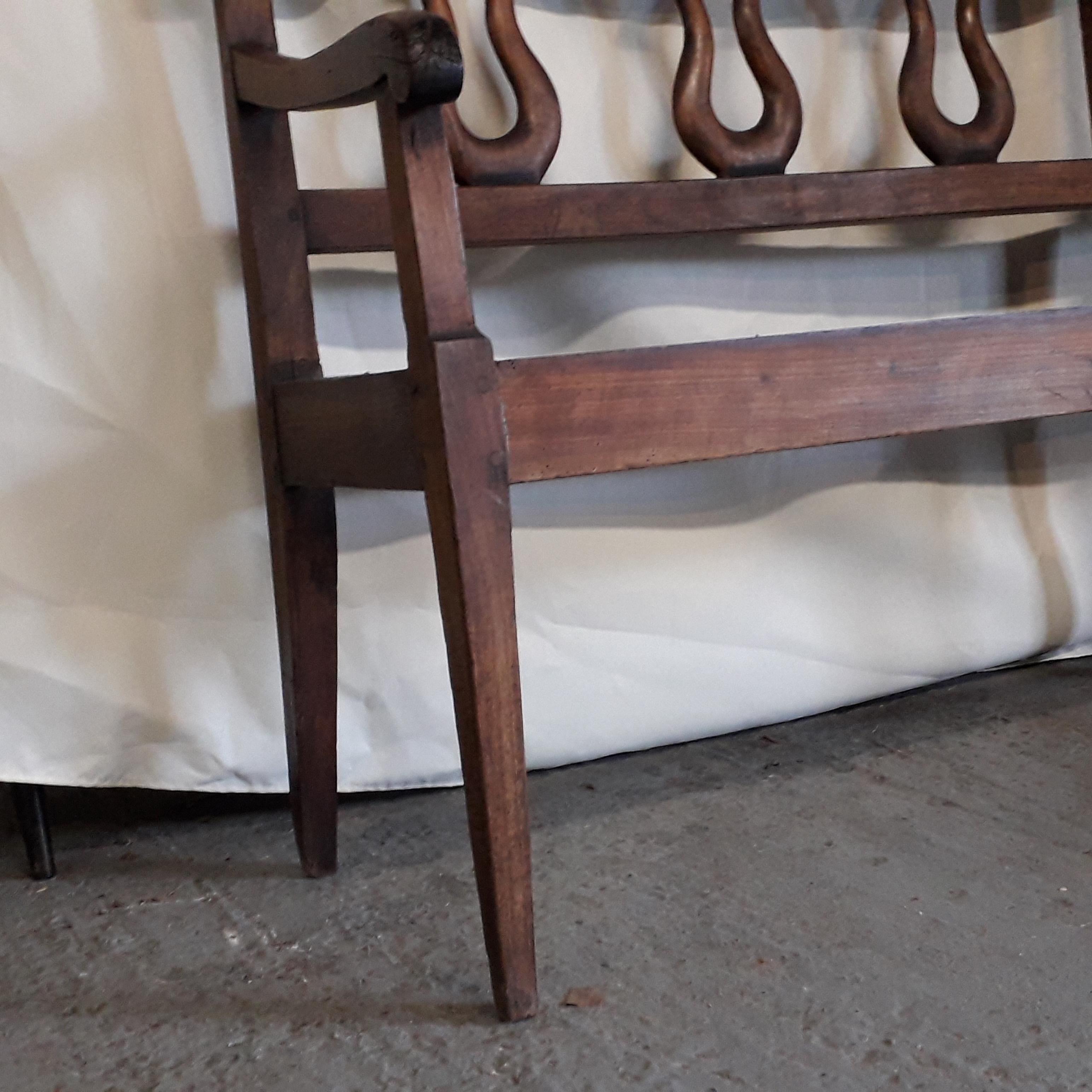 A high quality cherrywood provincial bench seat, the simple scroll arm and lyre back provides excellent detailing.
The piece is for upholstery; clients choice of fabric.