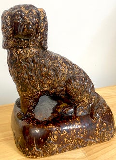 19th Century Bennington Pottery Seated Spaniel with Treacle Glaze, circa 1860s