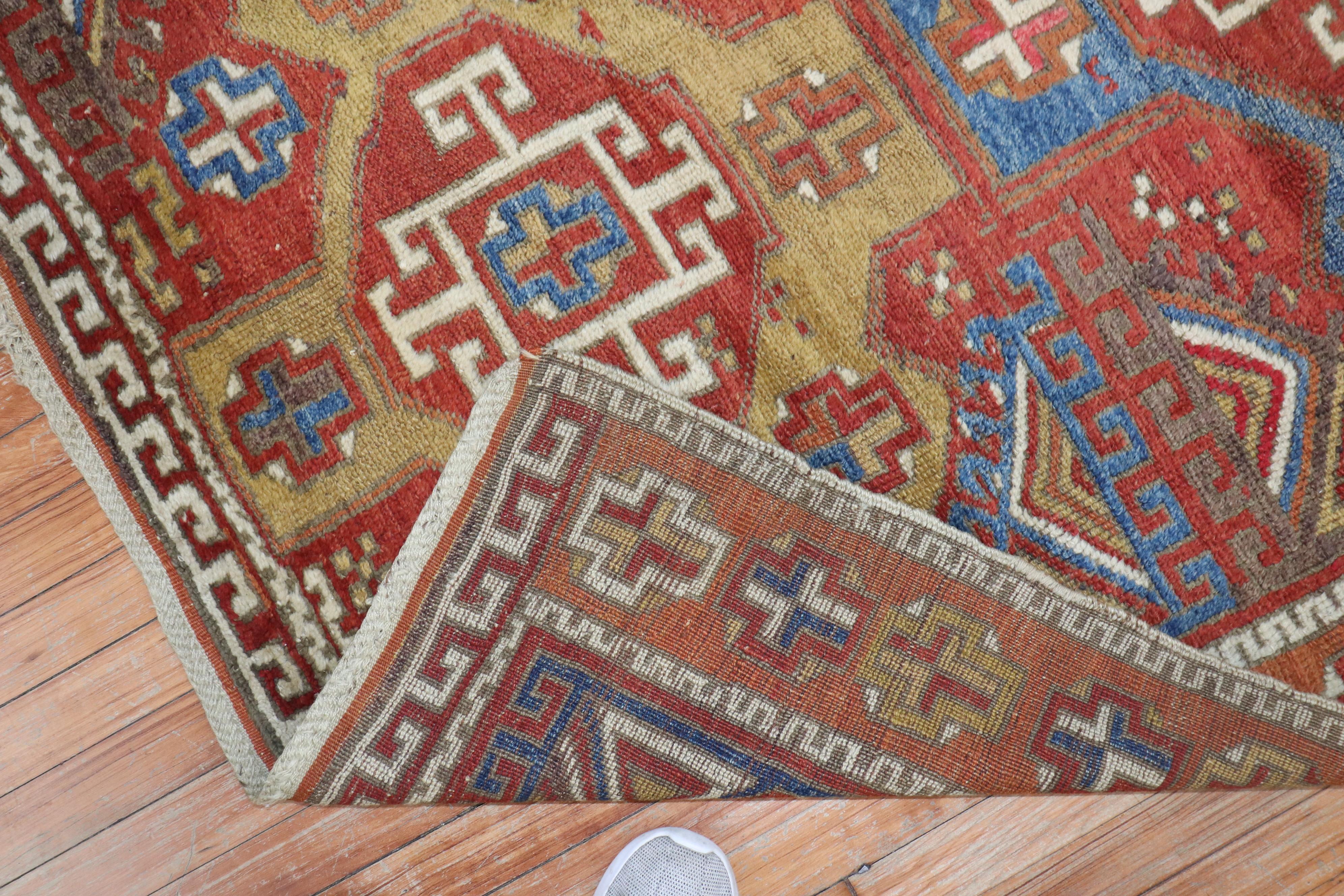 Late 19th century restored Turkish Bergama rug. The field is coral, the border is orange, dominant accents in blue and brown, circa 1880

Measures: 4'6