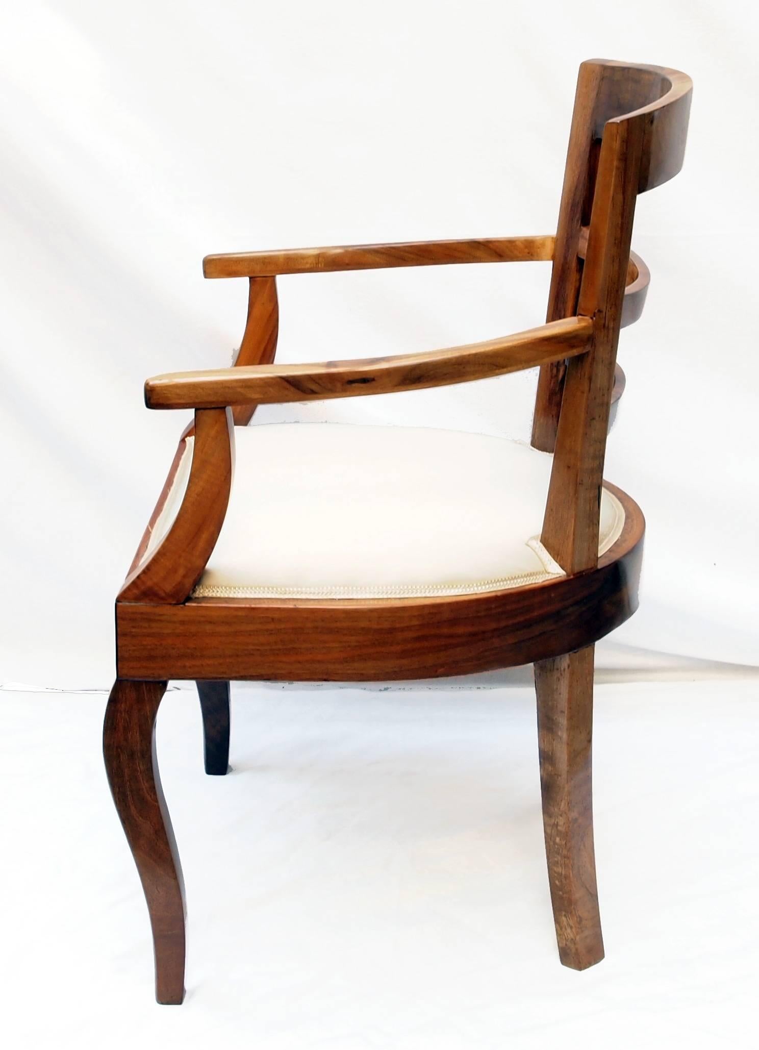 Beautiful Biedermeier armchair from Germany, very good restorated condition. Solid walnut wood and completely new upholstered.

Measures: Seat height 43 cm.