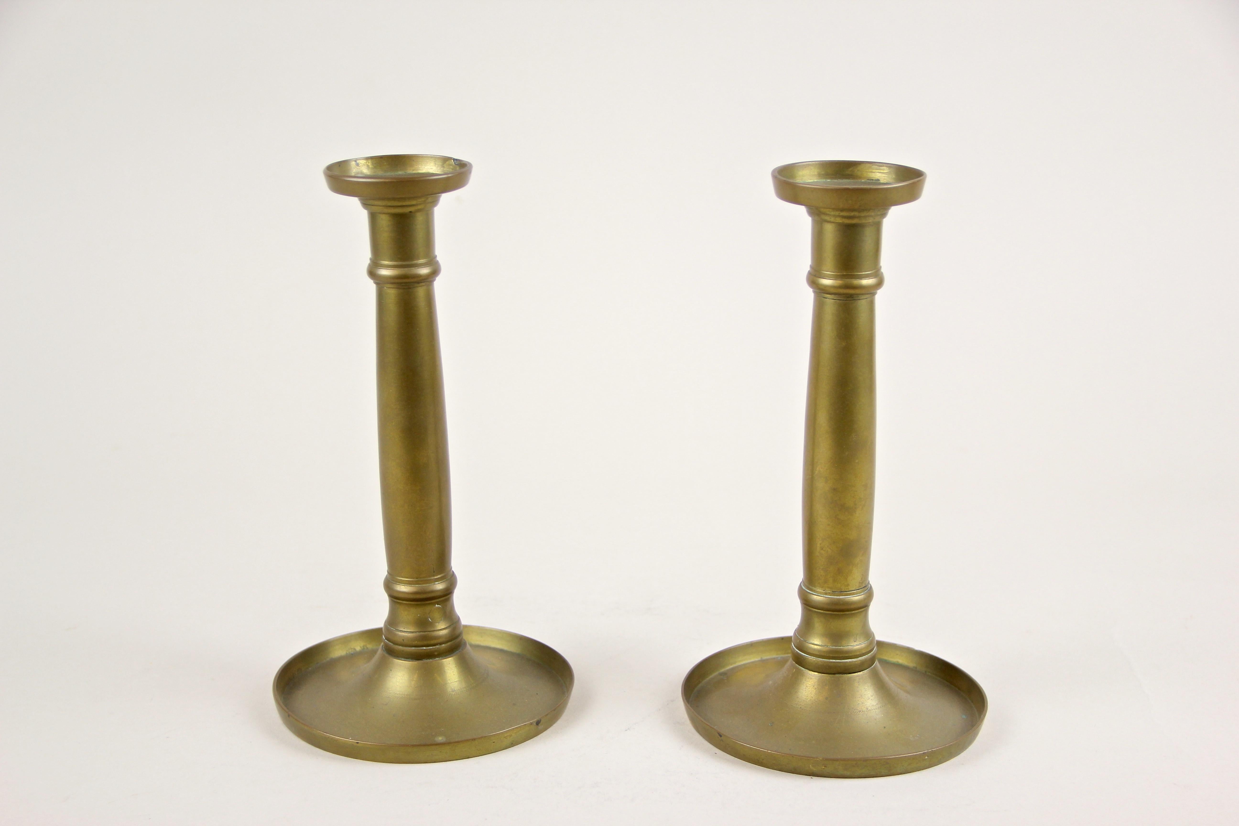 Fine 19th century Biedermeier brass candlesticks from Austria, circa 1830. A straight, clear shape - a typical attribute for the early Bidermeier period - processed of fine brass with details like the filigree chasing on the base (picture #11),