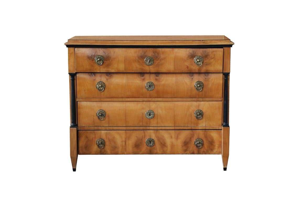 Hello,
We would like to offer you this elegant, early Biedermeier cherry four-drawer chest. The piece was made in Vienna circa 1825.

Viennese Biedermeier is distinguished by their sophisticated proportions, rare and refined design and excellent