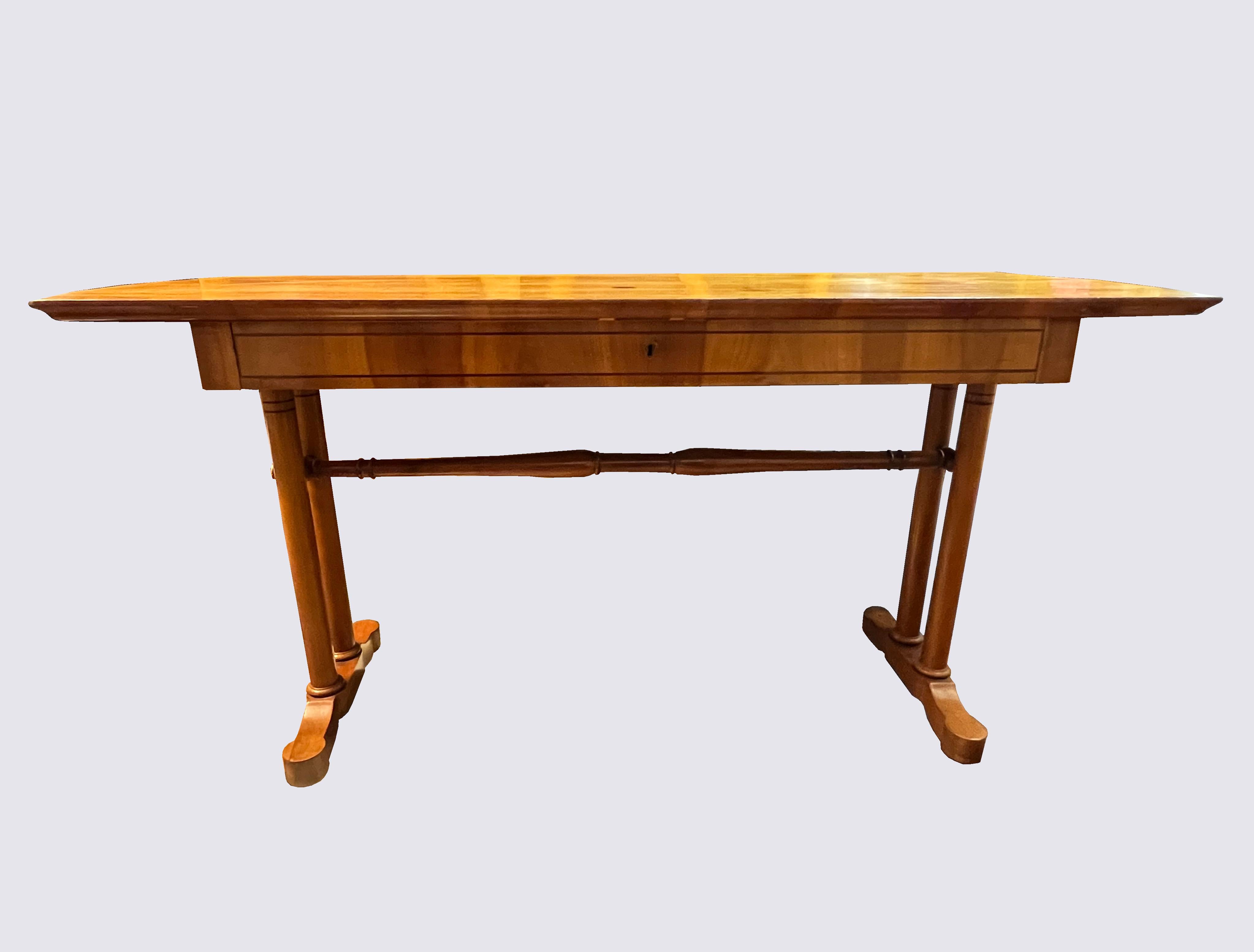 Hello,
This exceptional Viennese Biedermeier cherry console side table was made circa 1825.

Viennese Biedermeier is distinguished by their sophisticated proportions, rare and refined design and excellent craftsmanship and continue to have a great