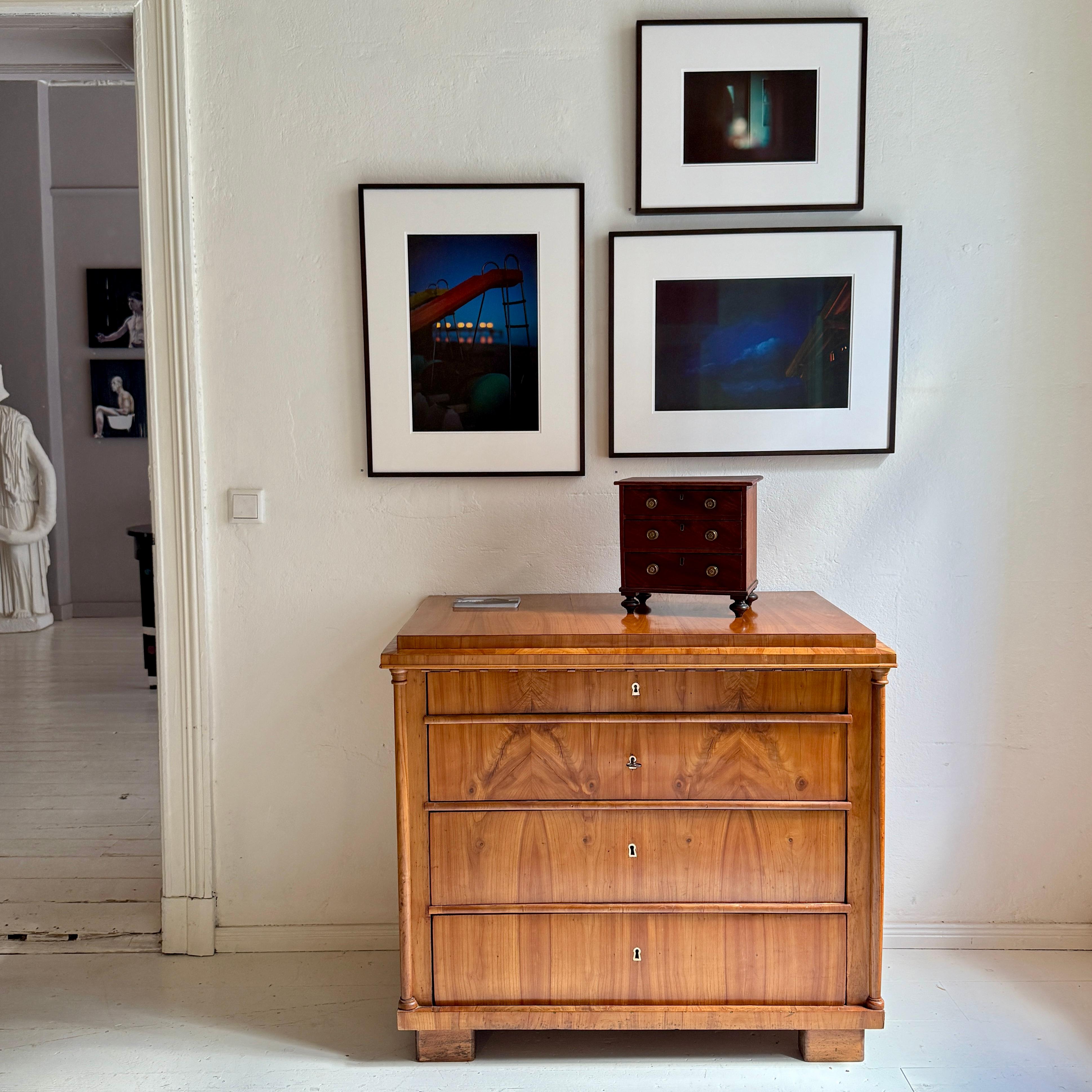 German 19th Century Biedermeier Chest of Drawers in Cherrywood with Columns, circa 1820 For Sale