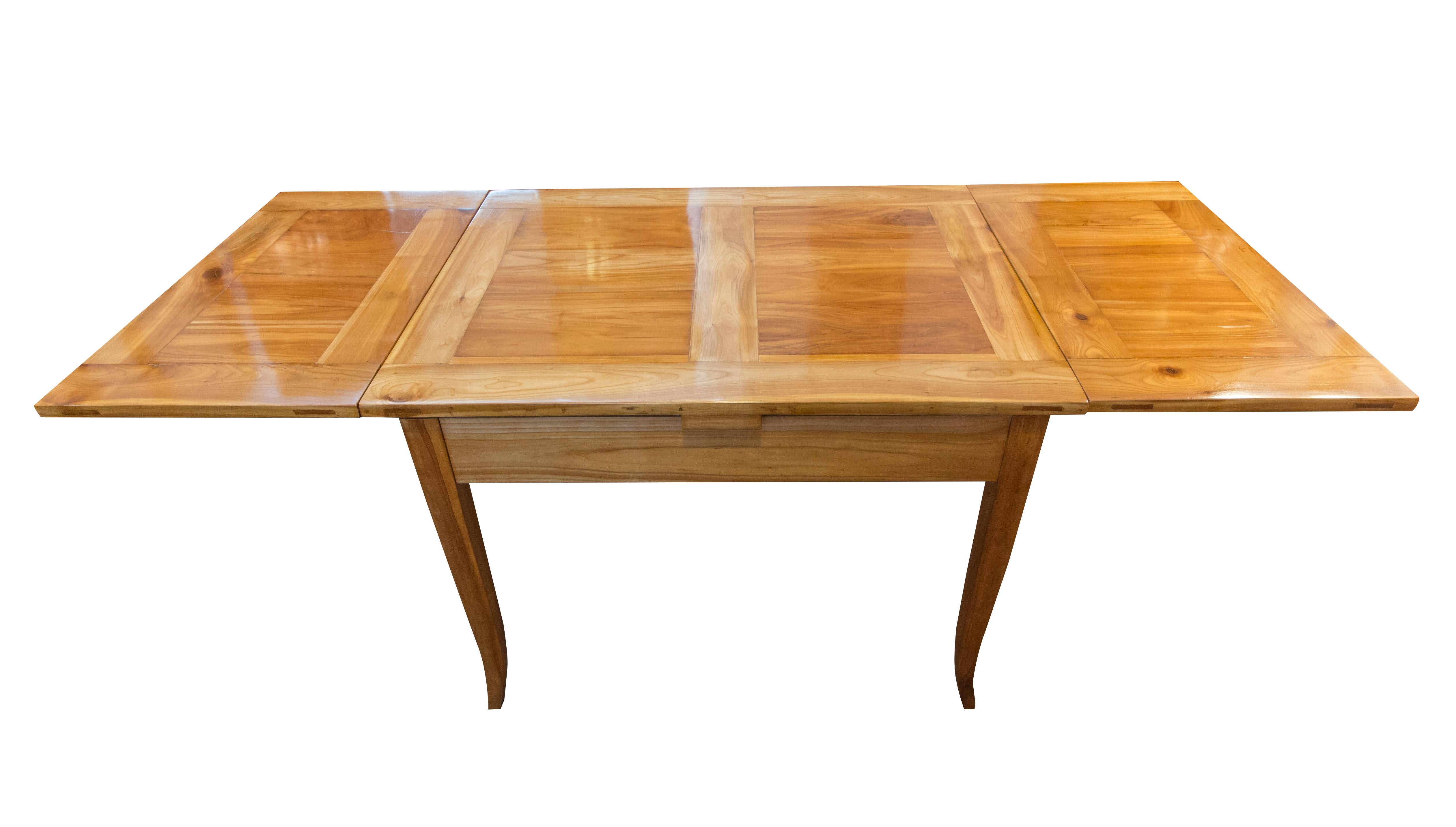 Beautiful dinner table from the time of Biedermeier. The table is made of solid cherrywood and has one-drawer. The table is in a very good condition.
Measure: The space up to the frame is 57.5 cm high. The table can be extended at both side 44.5