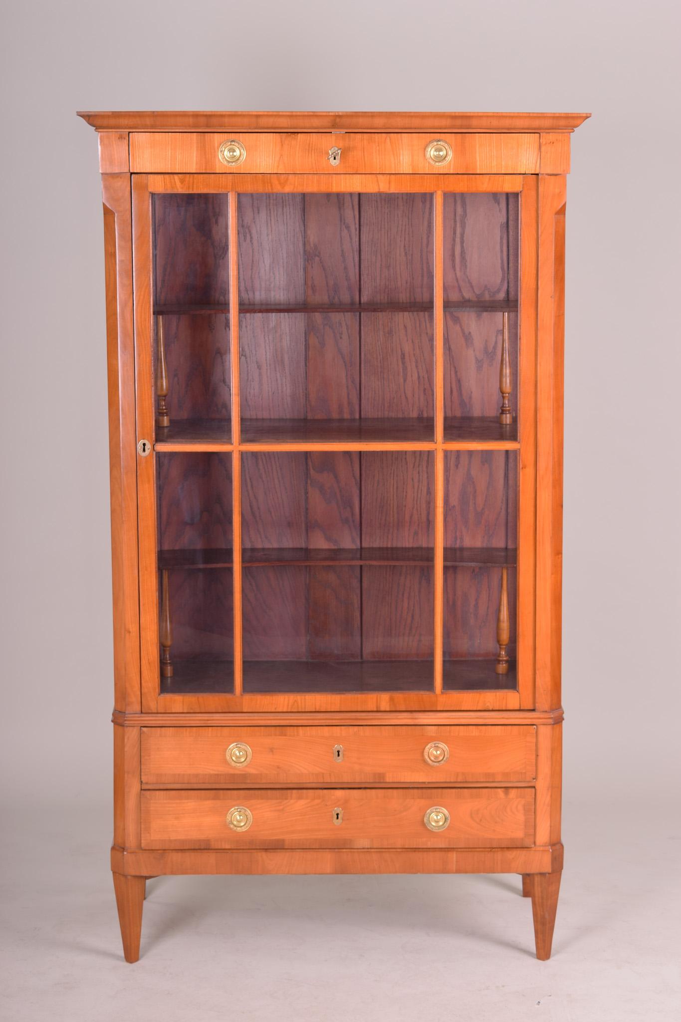 19th century Biedermeier display cabinet from Bohemia.
Completely restored, surface made by shellac polish.