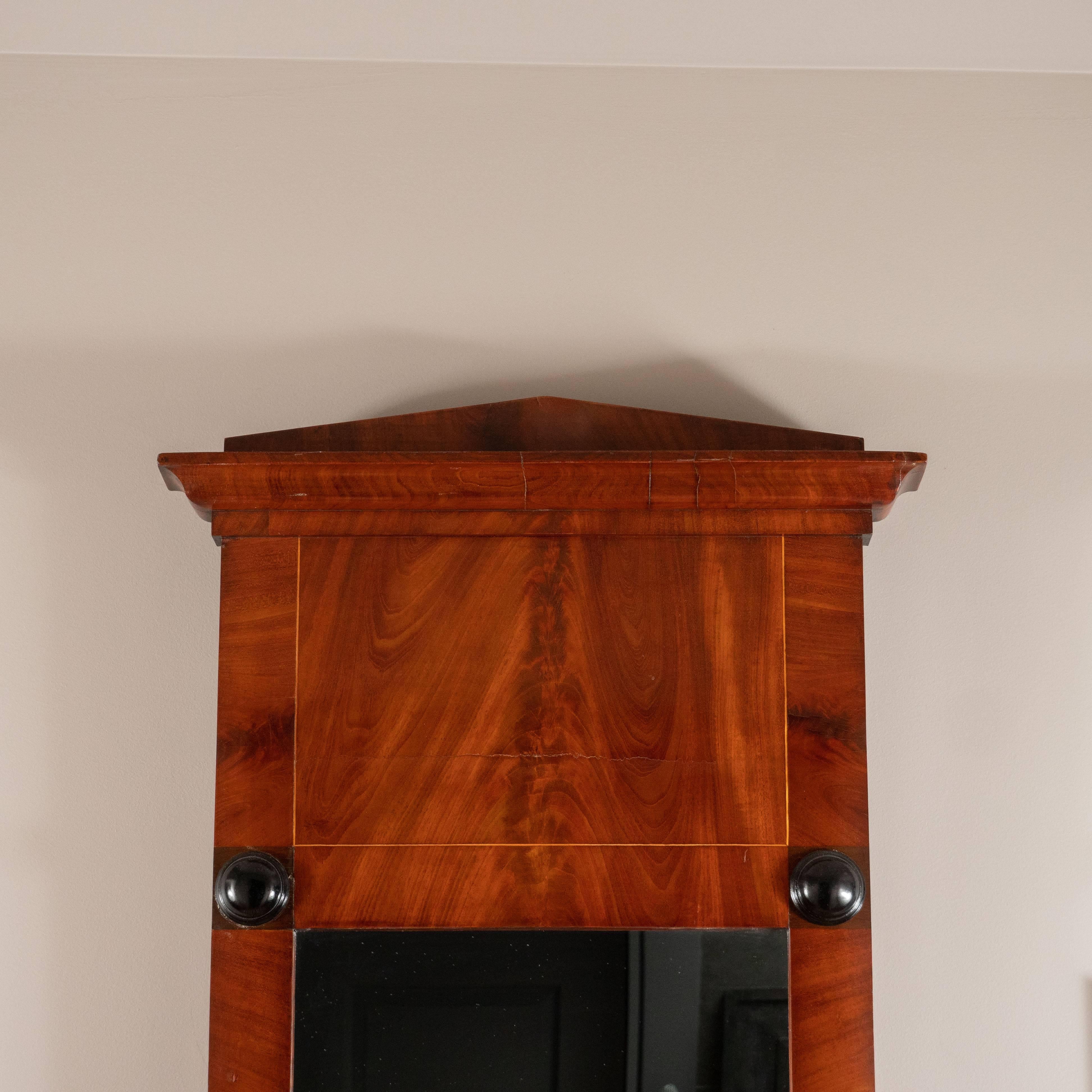 19th century Biedermeier mirror with cherry veneer and ebony detail.




 
 