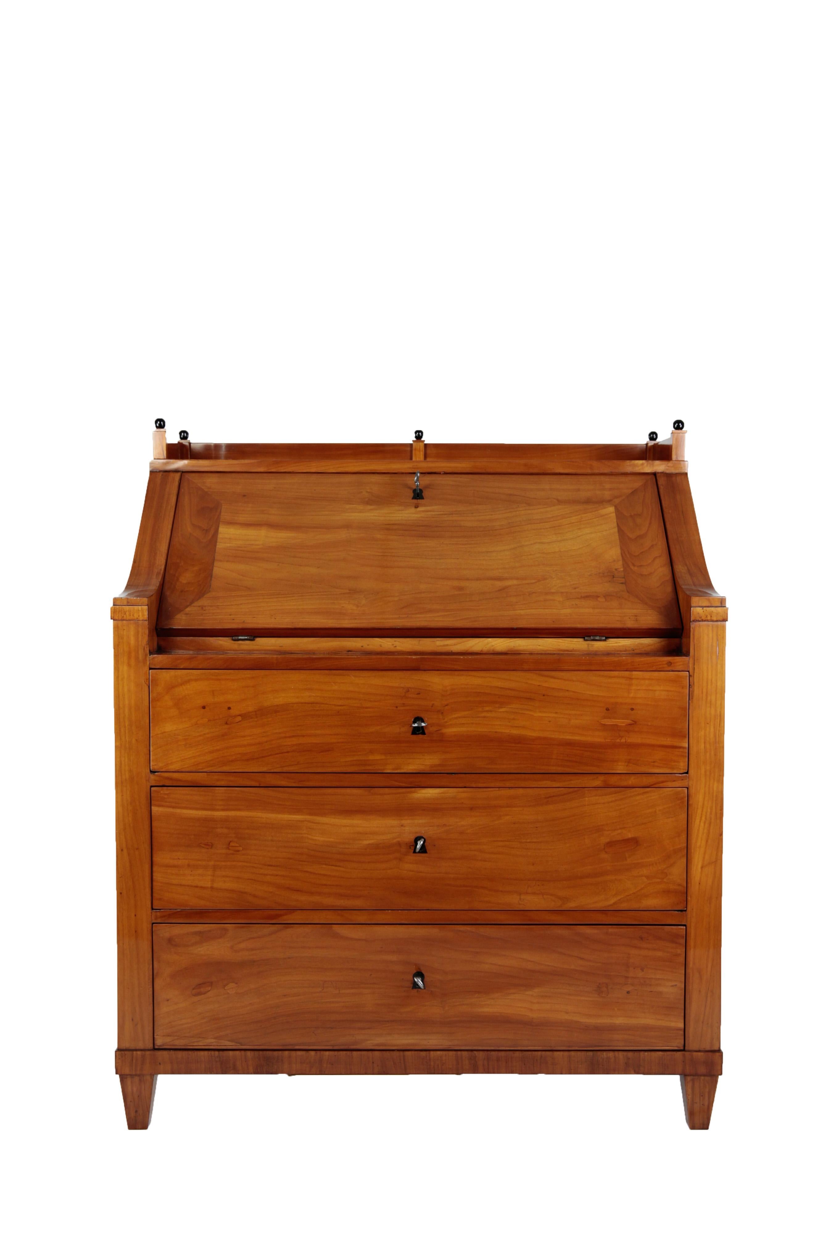 Secretary, circa 1830
cherrywood
3 spacious drawers, ebonized writing surface, small drawers with rootwood veneer on the inside
Restored residential-ready state
French shellac hand polish
Measures: Height 120 cm, width 100 cm, depth 61 cm,