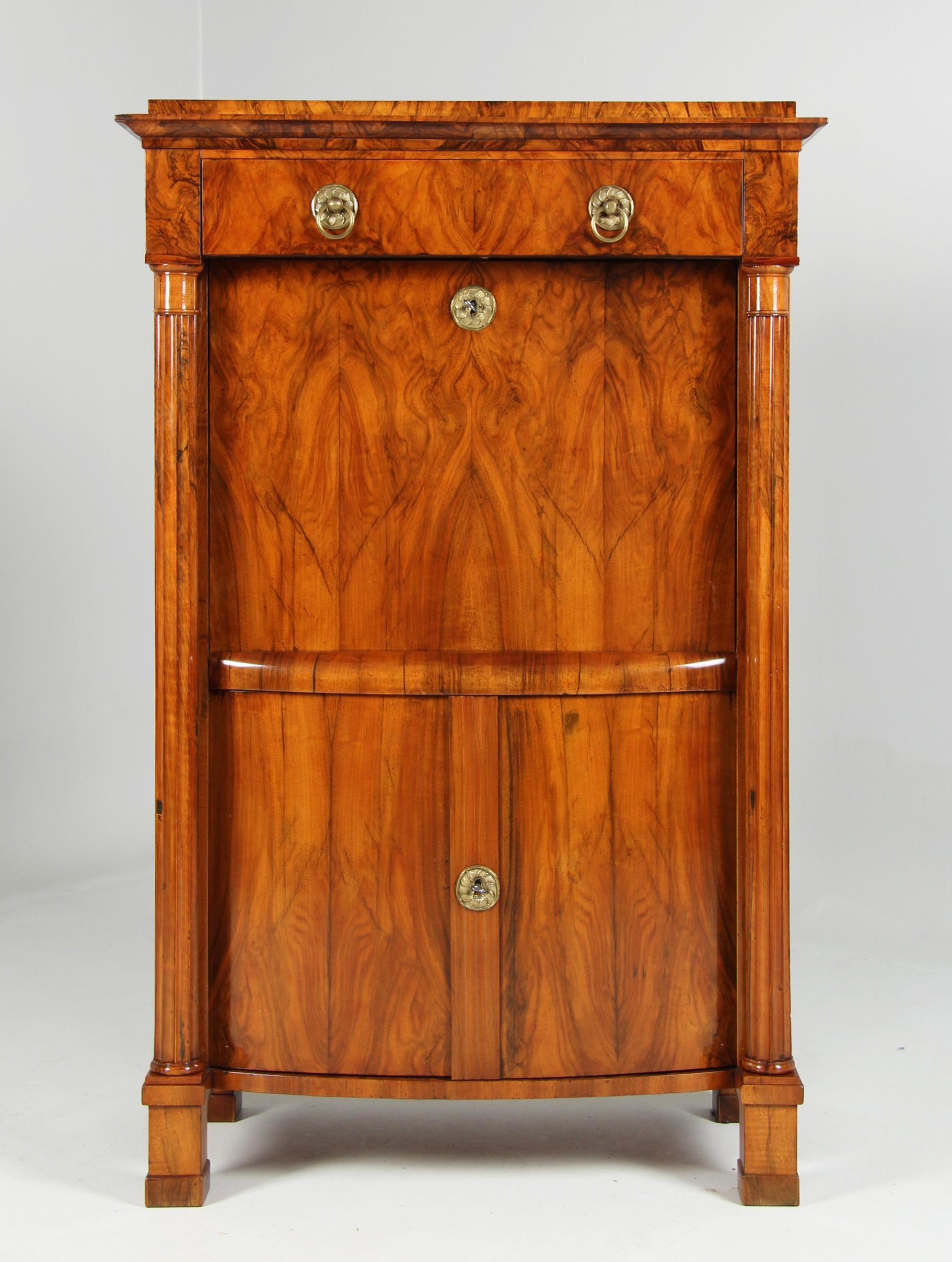 19th Century Biedermeier Secretary

Austria
Walnut
Biedermeier acirca 1830

Dimensions: H x W x D: 156 x 100 x 53 cm

Description:
Very interesting writing cabinet from the Bohemian/Austrian Biedermeier period around 1830.

Body standing on ashlar