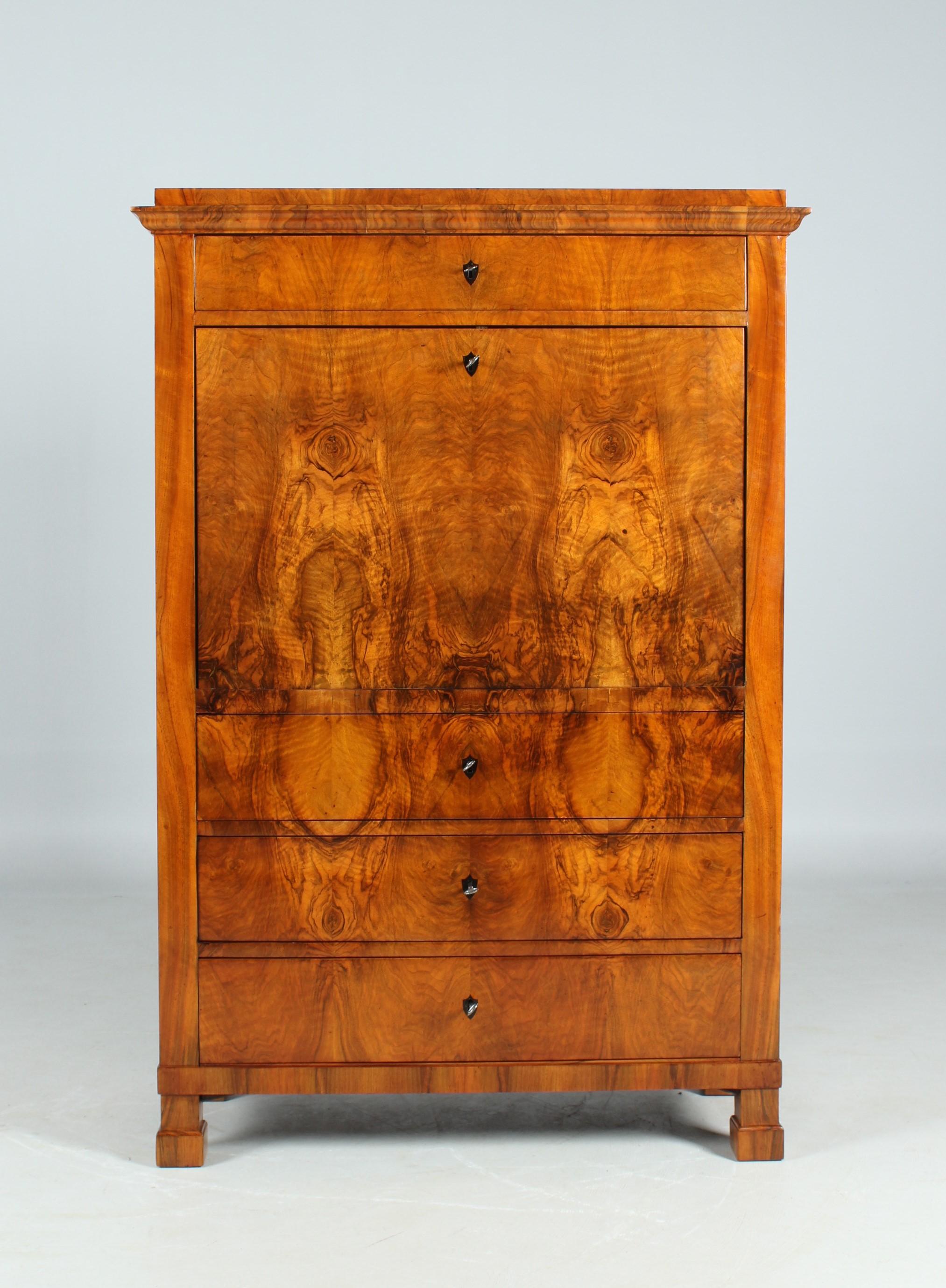 Antique Biedermeier Secretary

Austria
Walnut
Biedermeier around 1820

Dimensions: H x W x D: 158 x 108 x 49 cm

Description:
Strictly cubist secretary standing on square feet.

The furniture front and also the sides have a beautiful and