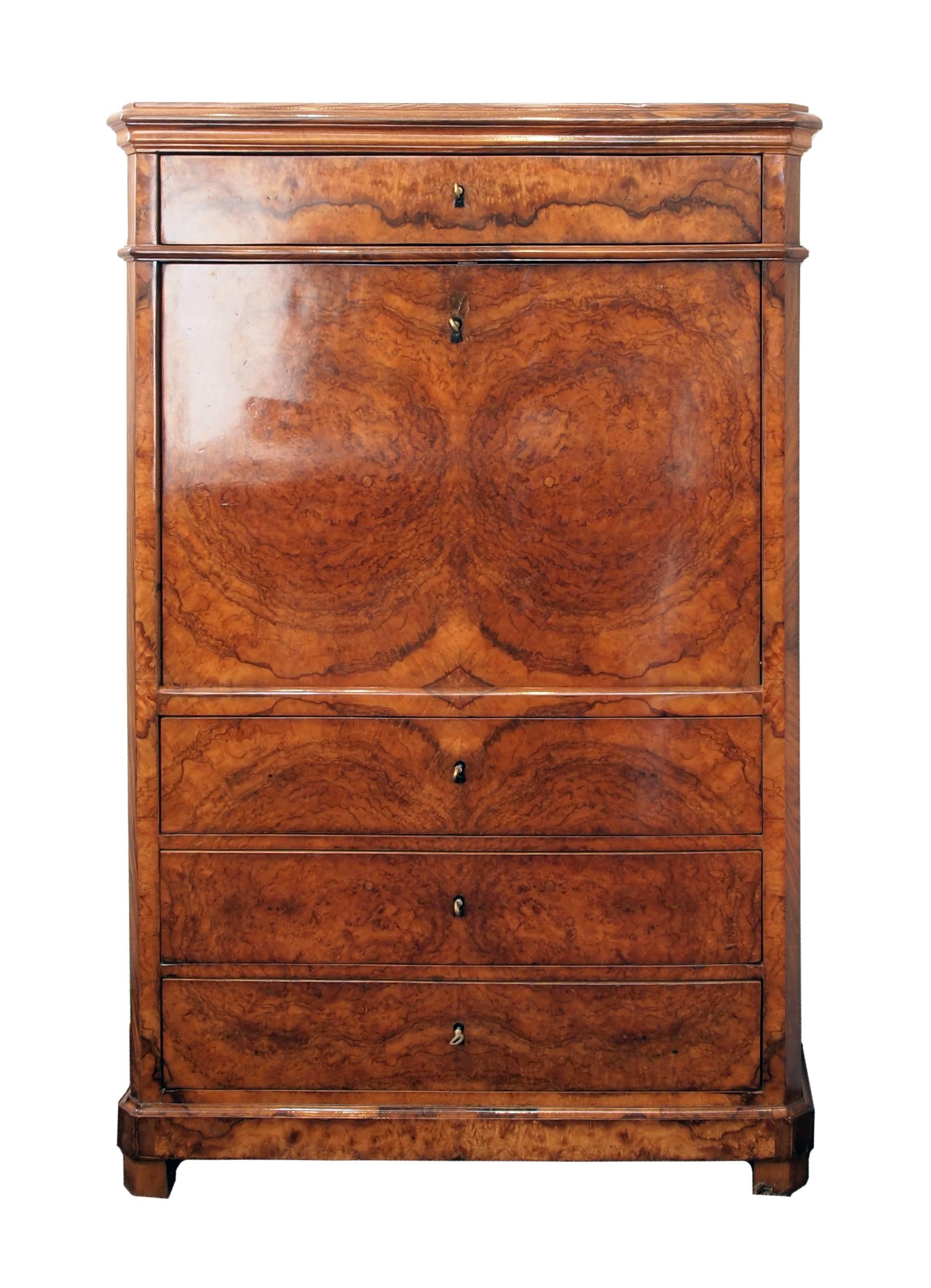 A beautiful secretary made of walnut veneer on a pine wood body, from the time of the Biedermeier.
The interior of the secretary is made of bird’s-eyes maple. In very good restored condition.
Measure: Writing height 74 cm.