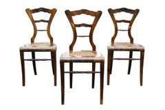 19th Century Biedermeier Set of Three Walnut Chairs. Vienna, c. 1825.