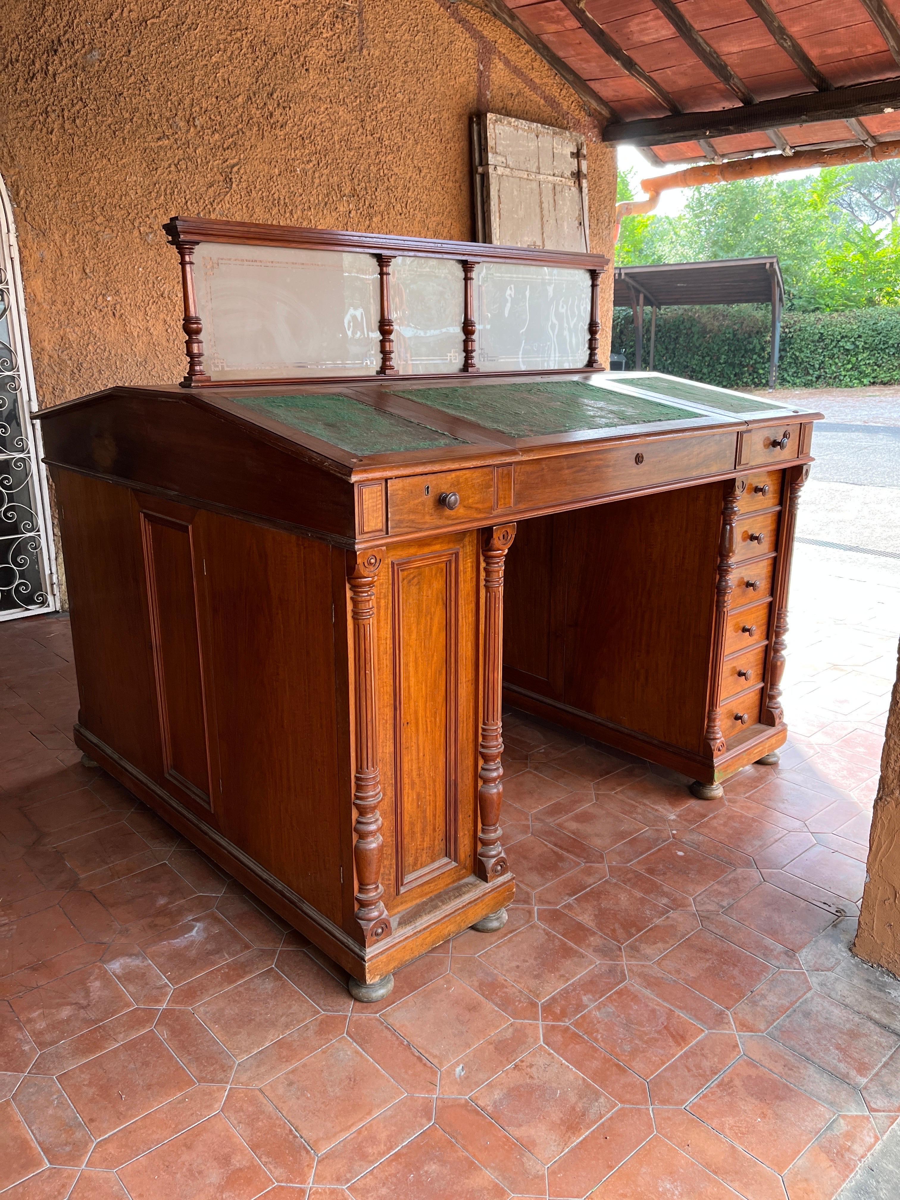 Incredible and Majestic Library desk, Biedermeier style, in good condition, in need of conservation restoration. The only thing missing is a wooden railing on the side that has been lost.The desk is made of walnut and Swedish pine frame.This is a