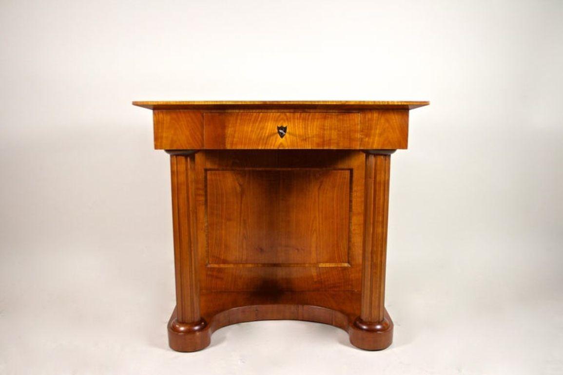 Very appealing mid 19th century cherrywood Console Table from the second Biedermeier period around 1860 in Austria. Veneered in fine cherrywood this perfect restored Biedermeier console impresses with graceful curves and exceptional lines. Wonderful