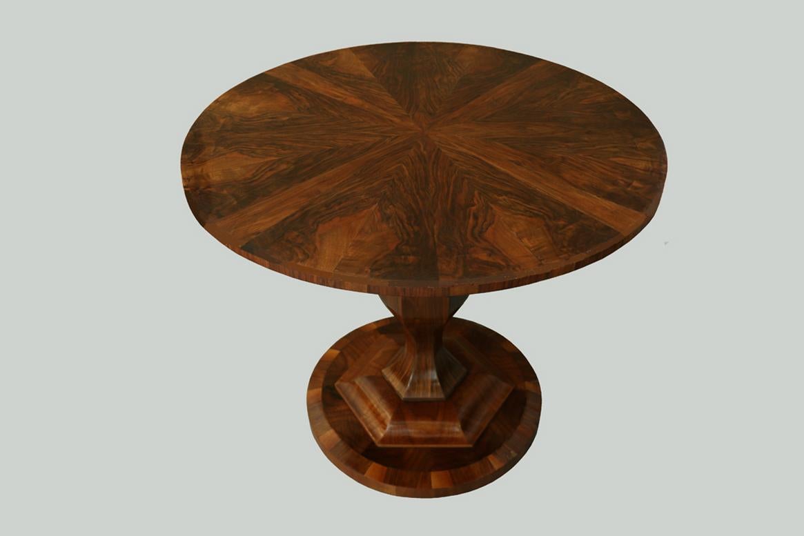 This fine Biedermeier walnut pedestal table was made circa 1825-30 in Vienna, Austria.

Viennese Biedermeier is distinguished by their sophisticated proportions, rare and refined design and excellent craftsmanship and continue to have a great
