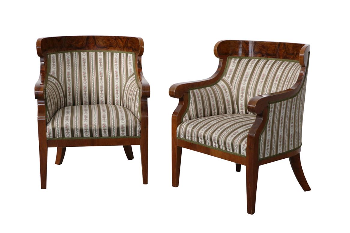 Hello,
This fine and elegant pair of Viennese Biedermeier chairs were made circa 1825-30.

Viennese Biedermeier is distinguished by their sophisticated proportions, rare and refined design and excellent craftsmanship and continue to have a great
