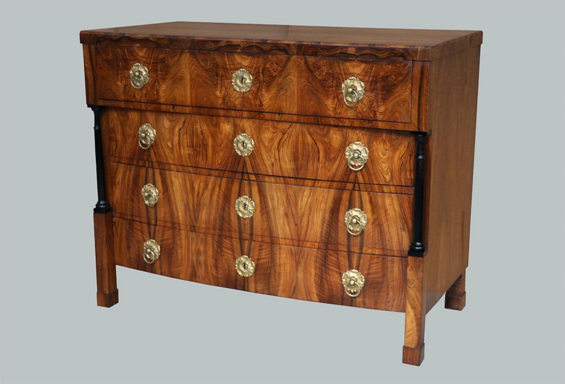 Hello,
This truly exquisite, early Biedermeier walnut commode was made in Vienna circa 1820-25.

Viennese Biedermeier is distinguished by their sophisticated proportions, rare and refined design and excellent craftsmanship and continue to have a