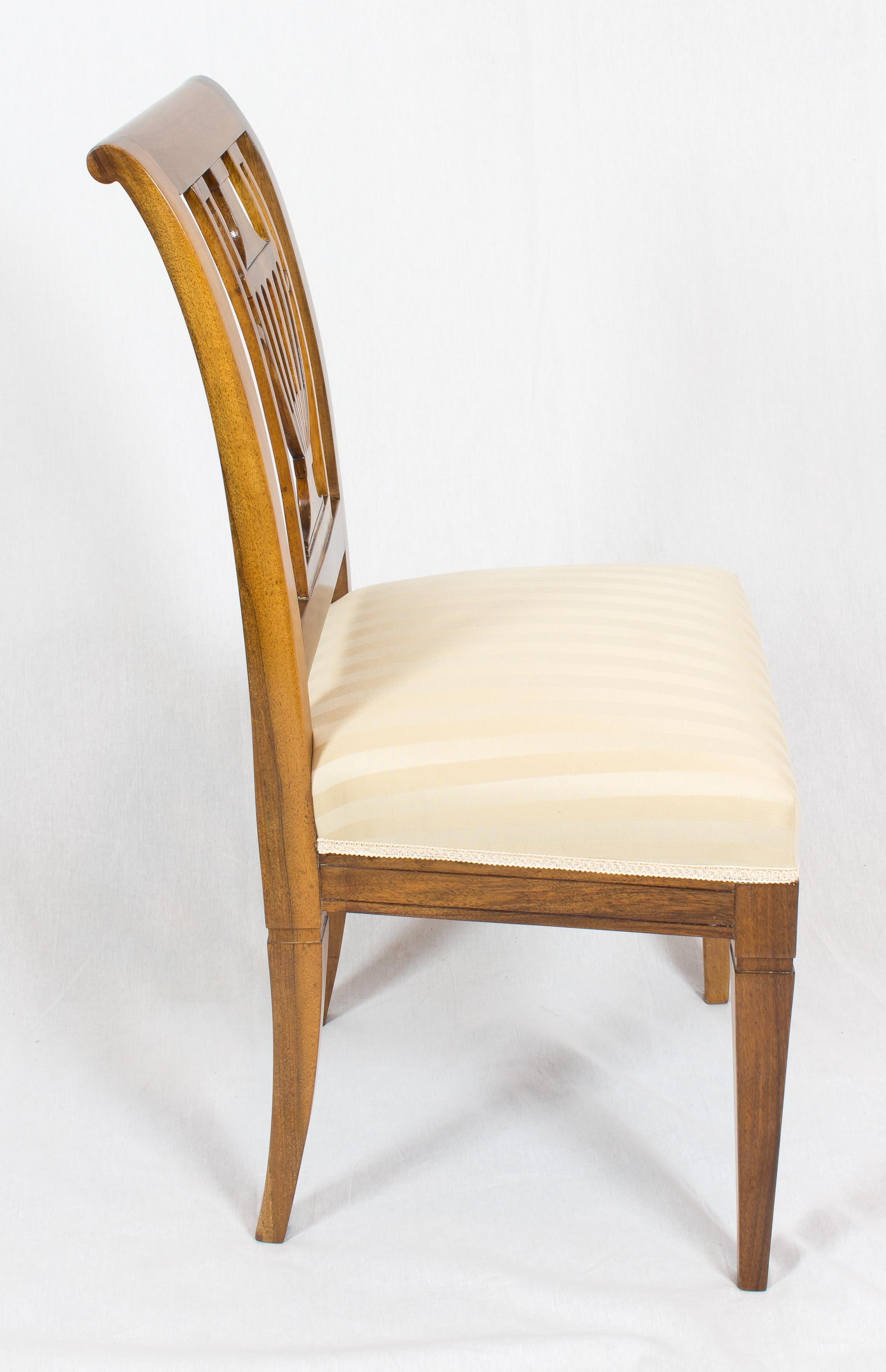 Very nice Lyra chair from the Biedermeier period, circa 1825. The chair is made of walnut wood. The chair was newly upholstered and covered with new fabric. In very good restored condition.