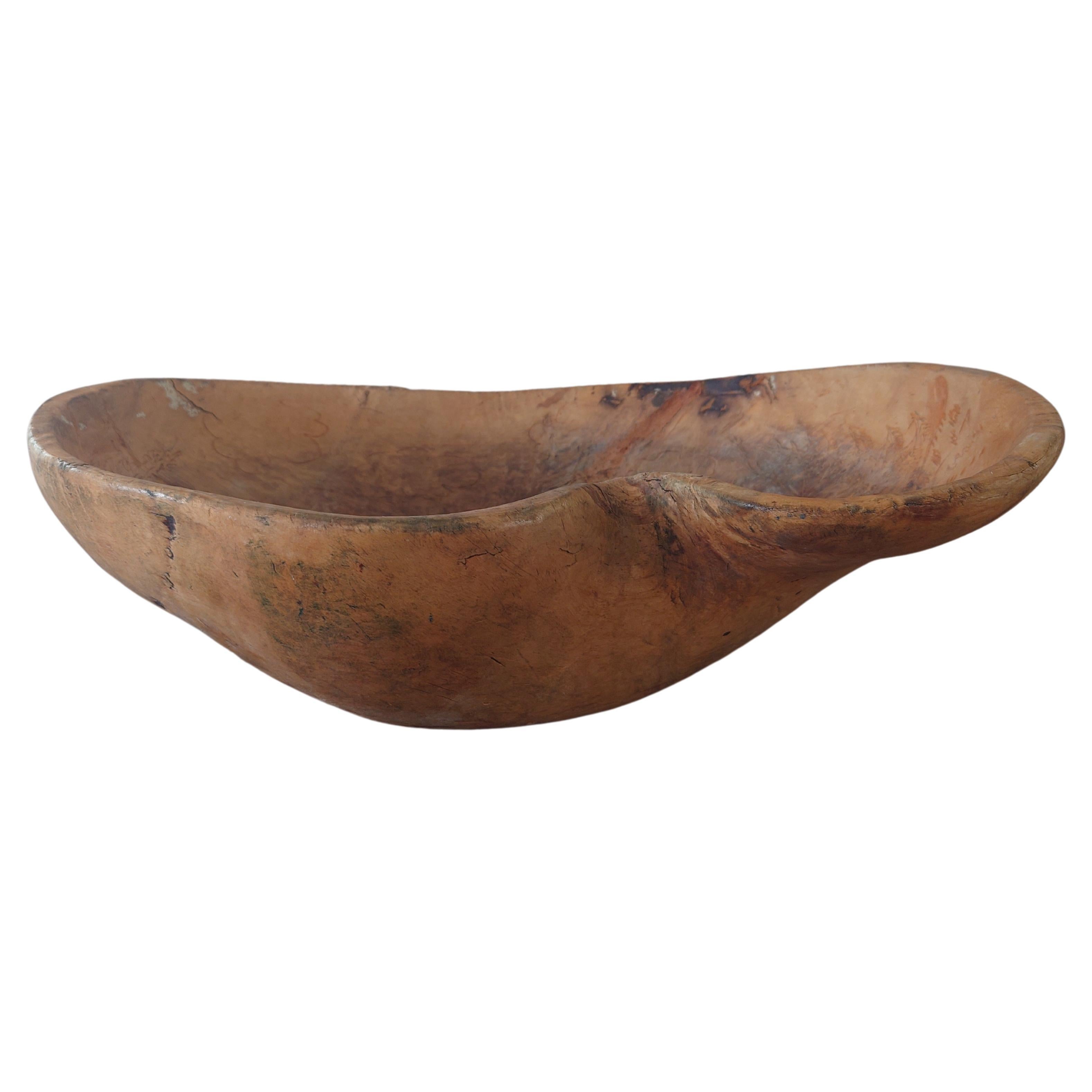 19th century Swedish wooden bowl  from Northern Sweden.
A genuine 19th century Swedish Folk Art Wooden bowl with lovely patina.
The bowl has a fantastically fine wood carving in the shape of a moose on a mountain inside the bowl. It is signed inside