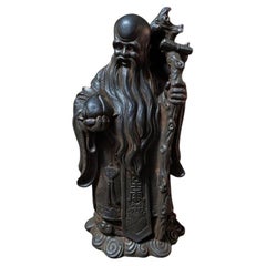 Statua di Dio della Longevità in ferro cinese vintage di 36 cm con bastone e pesca in mano
