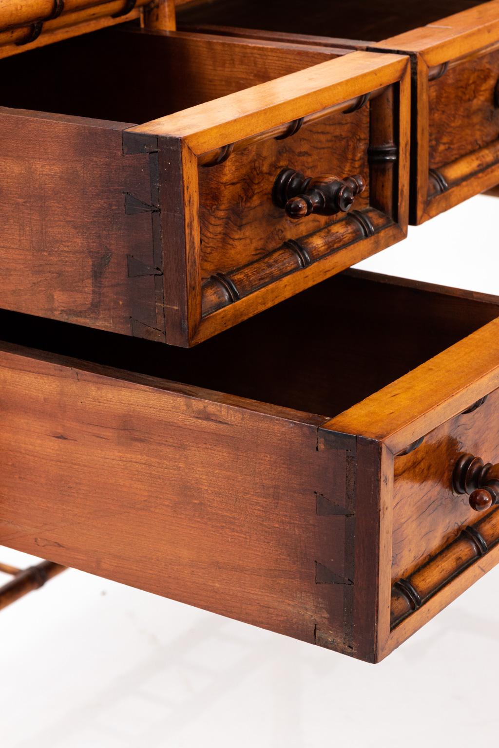 Attributed to 19th century American furniture maker R. J. Horner, this dresser is composed of bird's-eye maple with trim carved in imitation of bamboo. The dresser features a large rectangular upright vanity mirror.

        