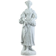 Statuette de jeune femme en biscuit avec fleurs, XIXe siècle