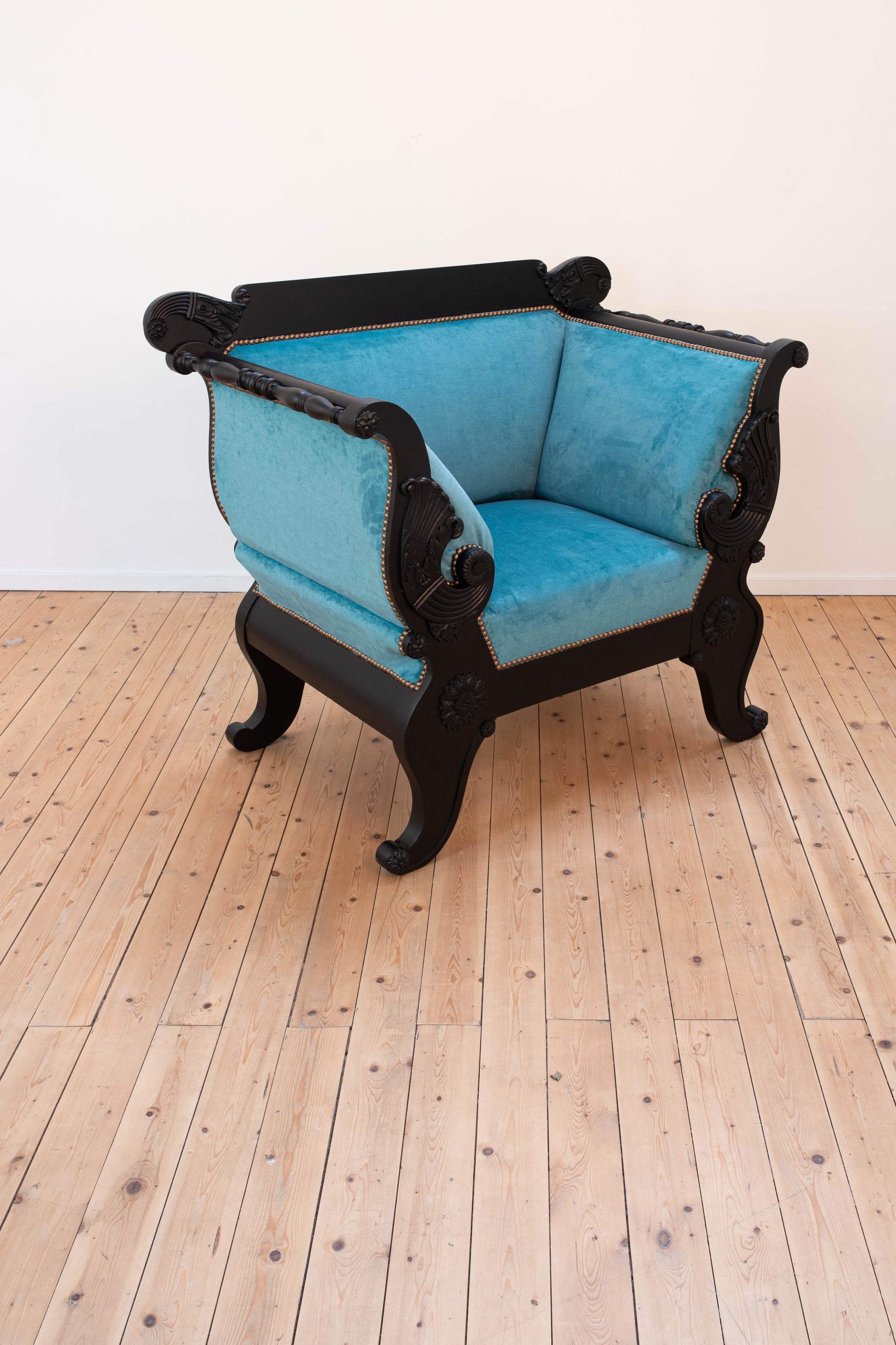 French 19th century black Biedermeier armchair with new blue velvet For Sale