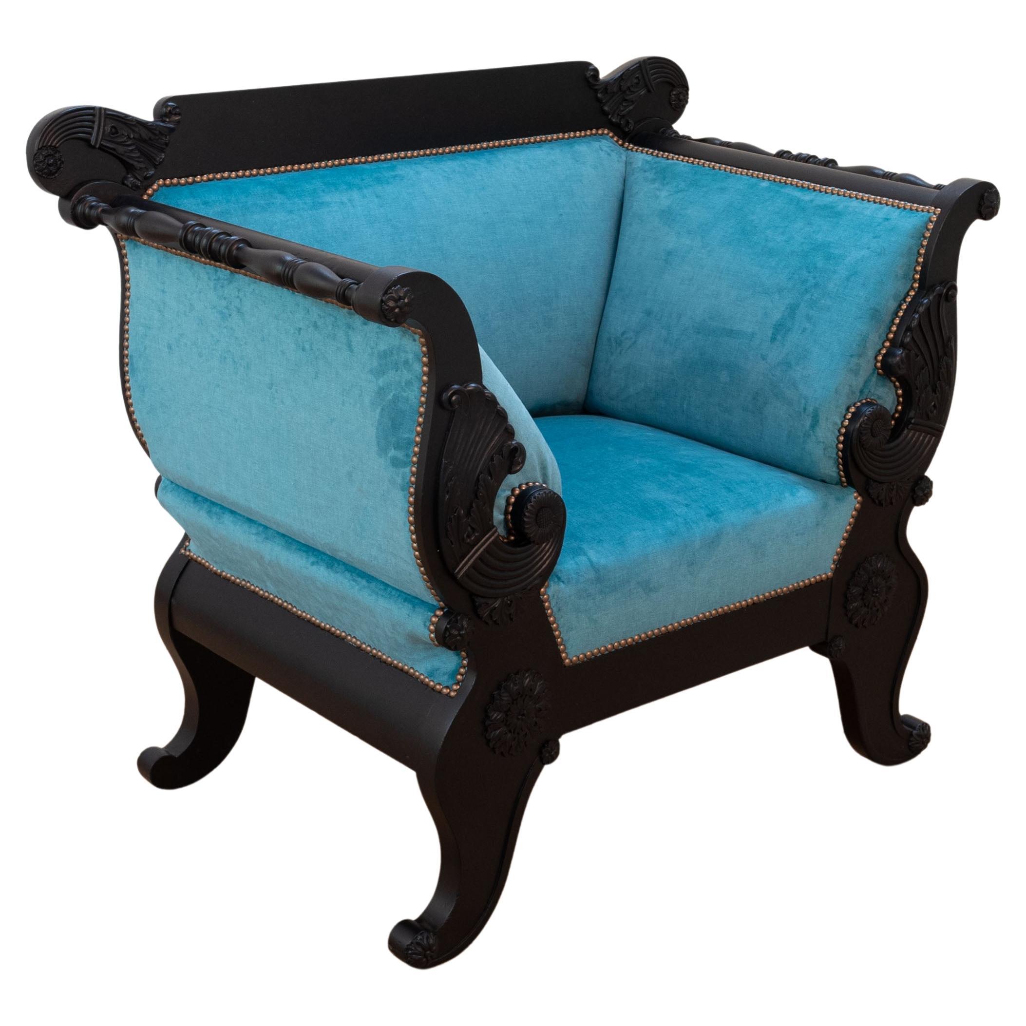 19th century black Biedermeier armchair with new blue velvet