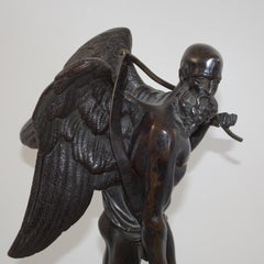 19th Century Black Bronze Statuette of Winged Old Man on Black Base