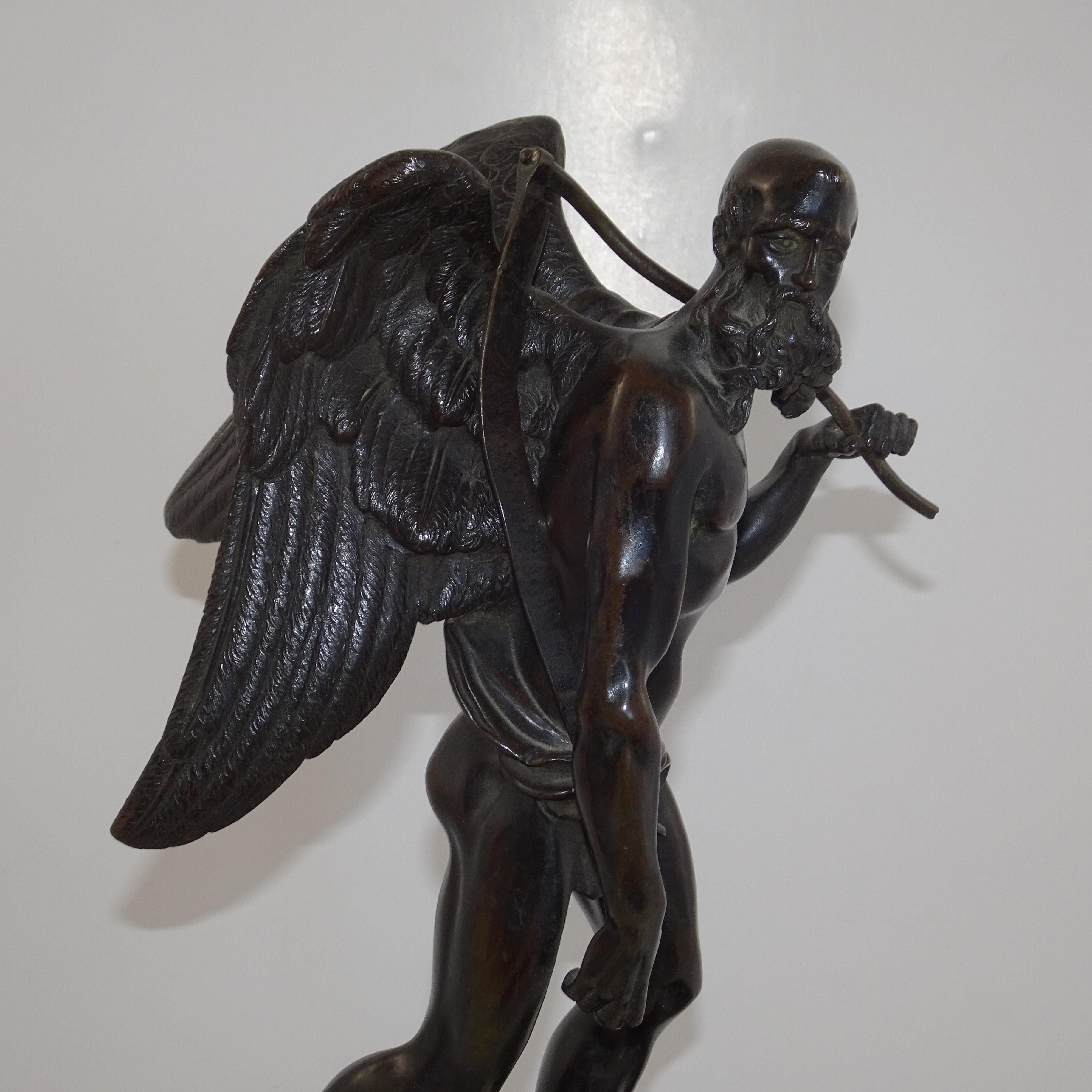Italian 19th Century Black Bronze Statuette of Winged Old Man on Black Base For Sale