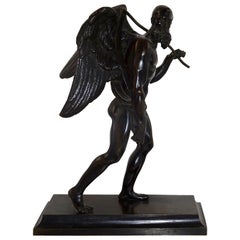 19th Century Black Bronze Statuette of Winged Old Man on Black Base