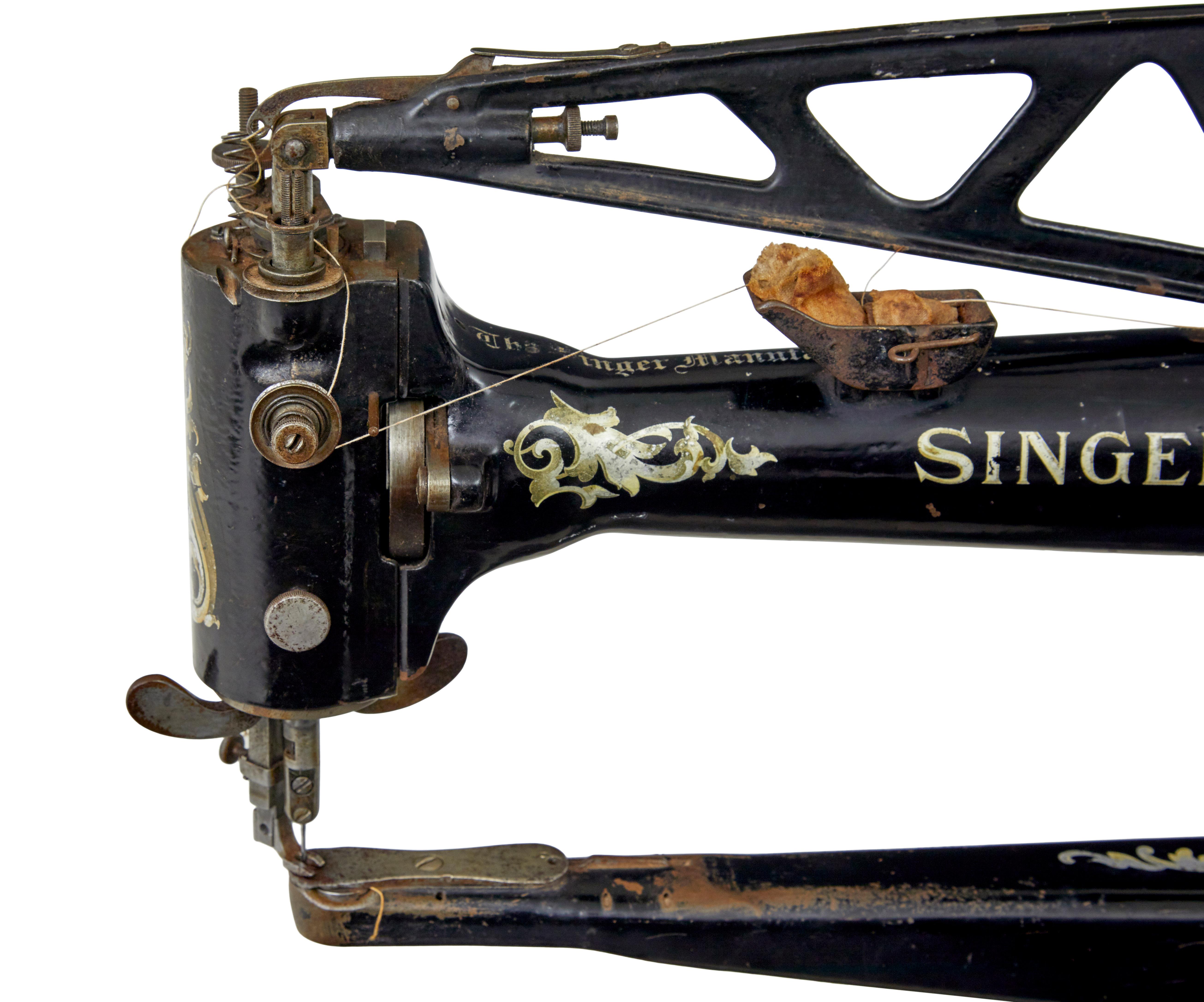 máquina de coser singer del siglo xix de la fábrica de hierro fundido negro Hierro