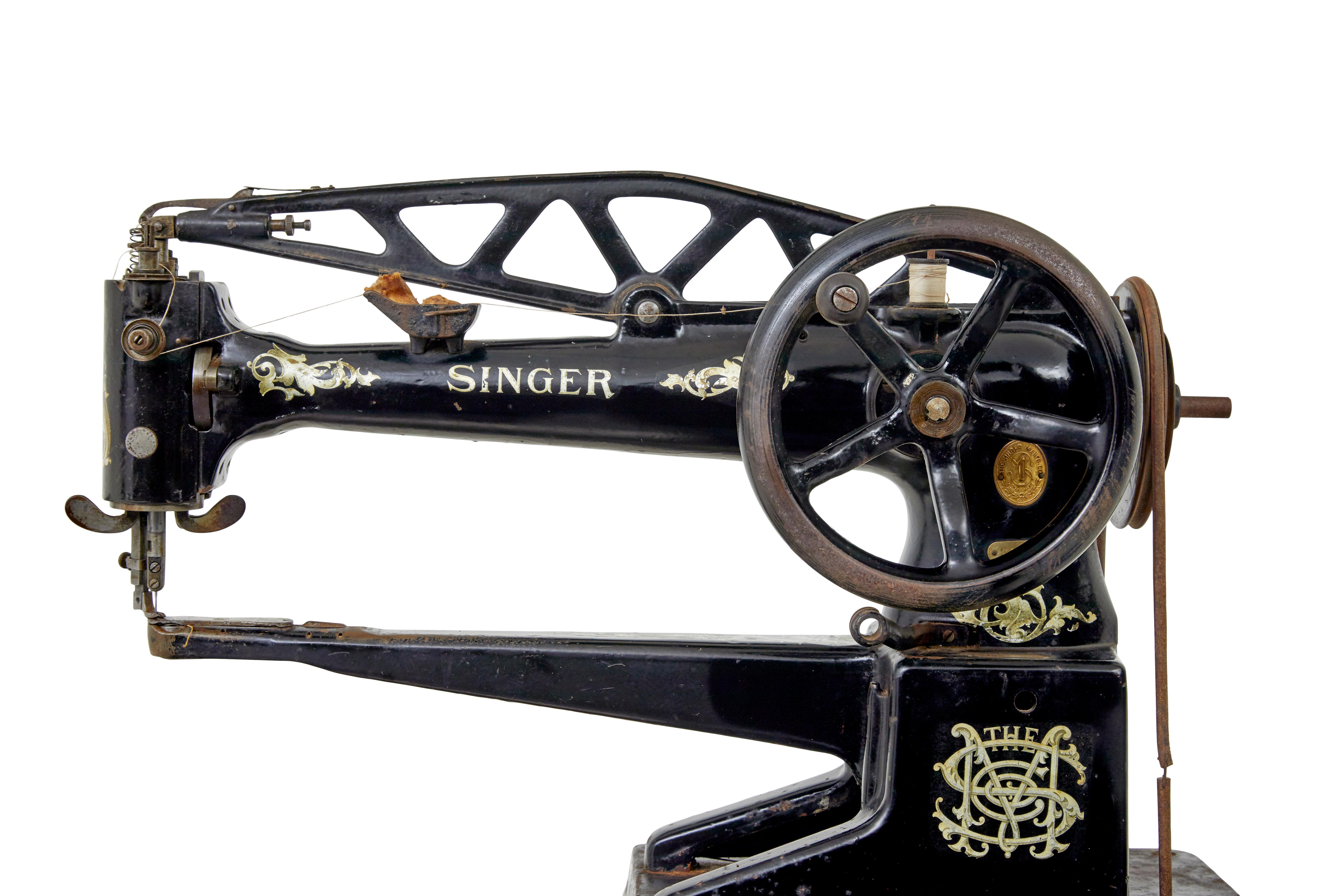 máquina de coser singer del siglo xix de la fábrica de hierro fundido negro Hecho a mano