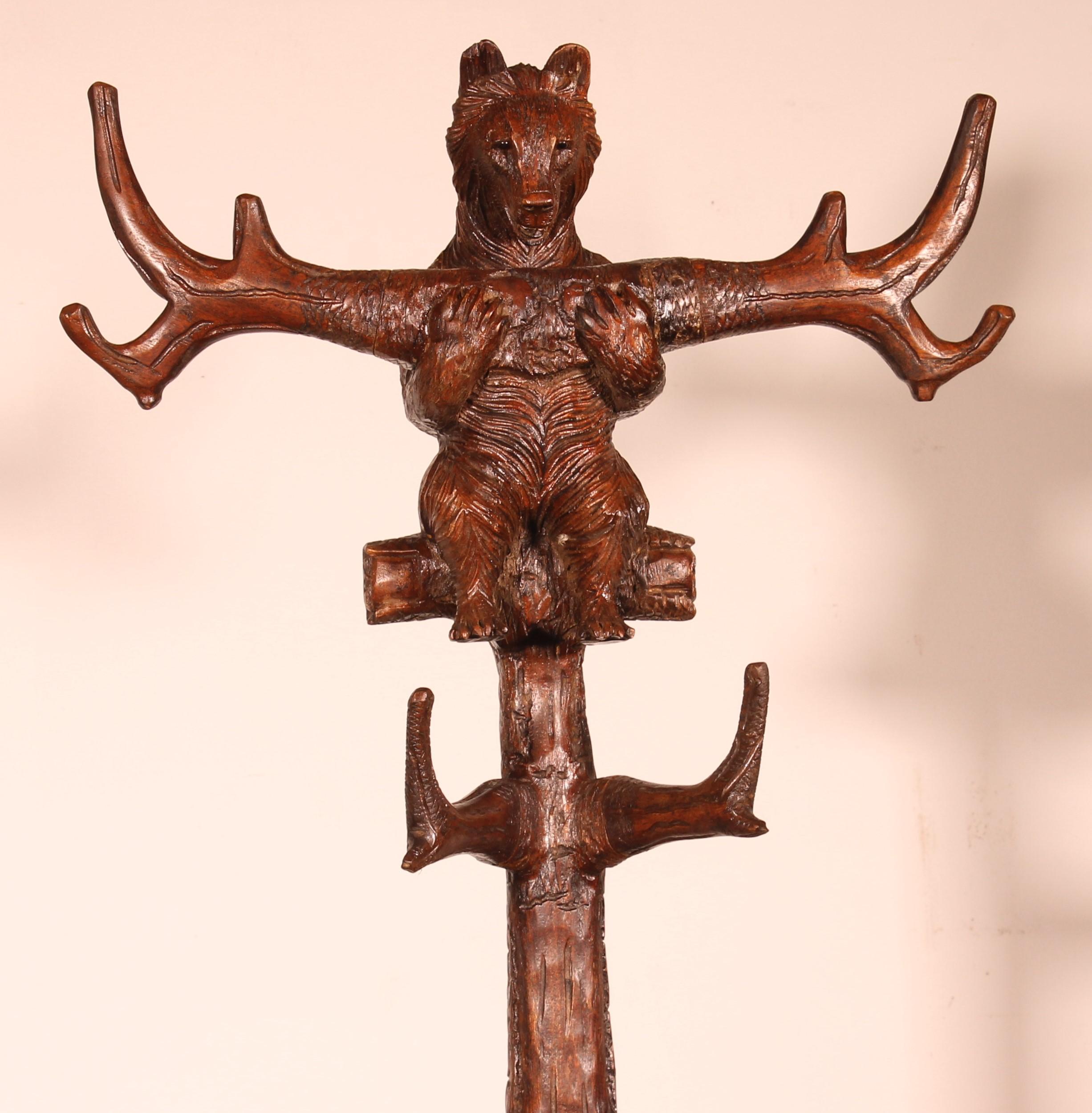 Swiss 19th Century Black Forest Bear Coat Rack In Carved Wood For Sale