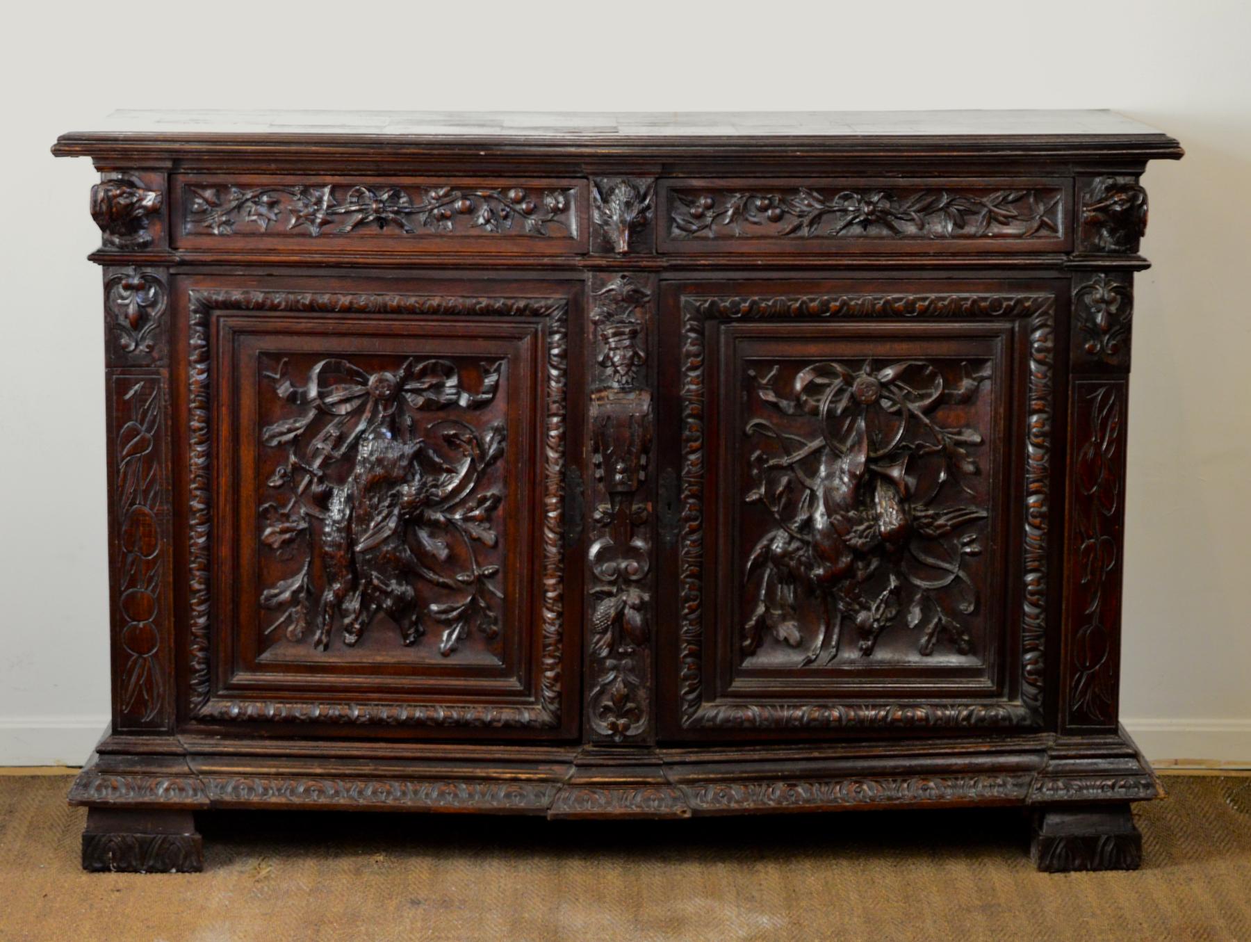 Perhaps you chase foxes. Race old cars. Whatever gives you chase and drives you towards a sporting life, so be it. Make sure you serve upon a buffet that is worthy of your catch. This late 19th century Black Forest styled sideboard would be a fine