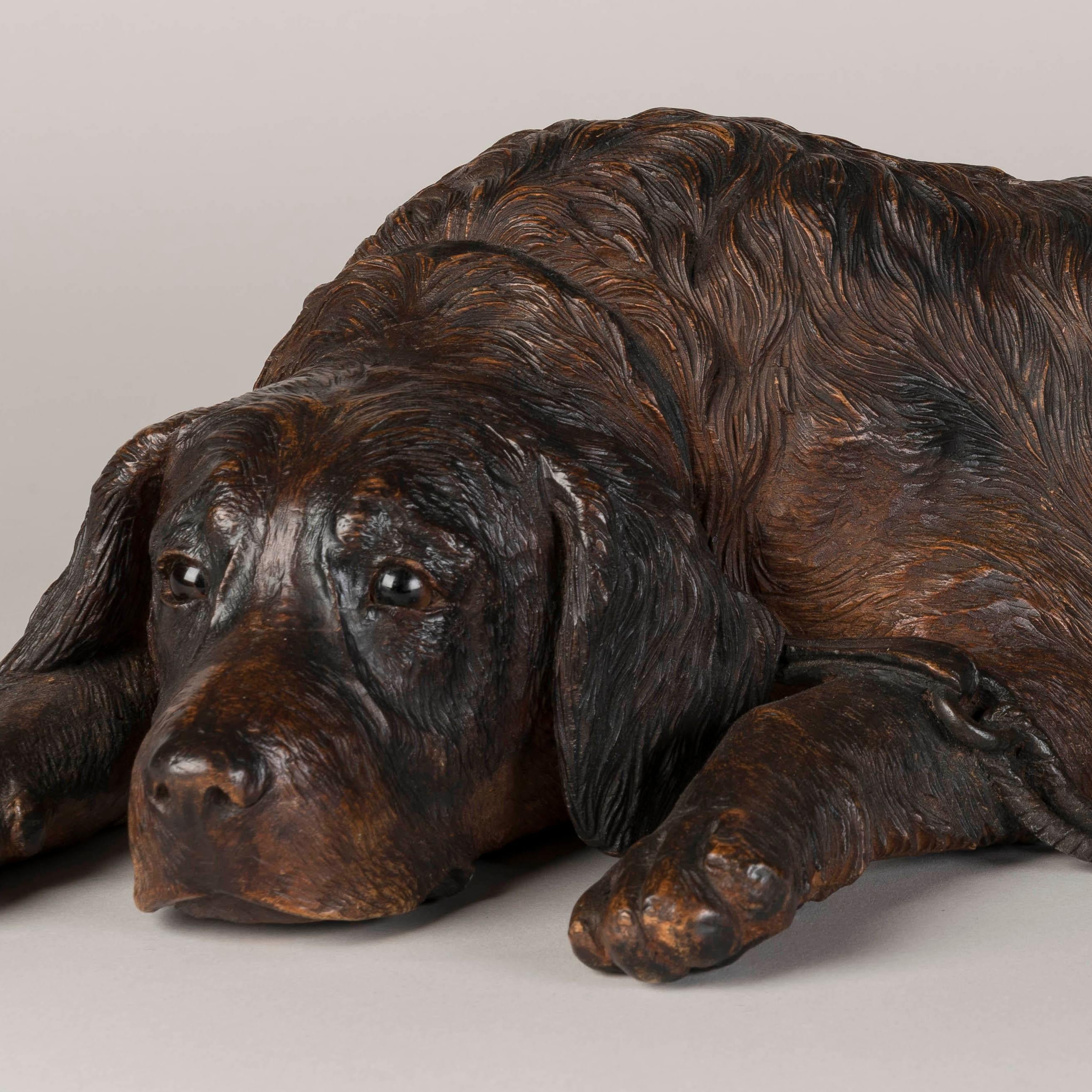 Swiss 19th Century Black Forest Carved Dog with Glass Inset Eyes For Sale