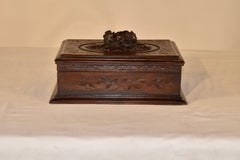 Coffret-bibliothèque du 19e siècle sculpté en Black Forest avec miroir