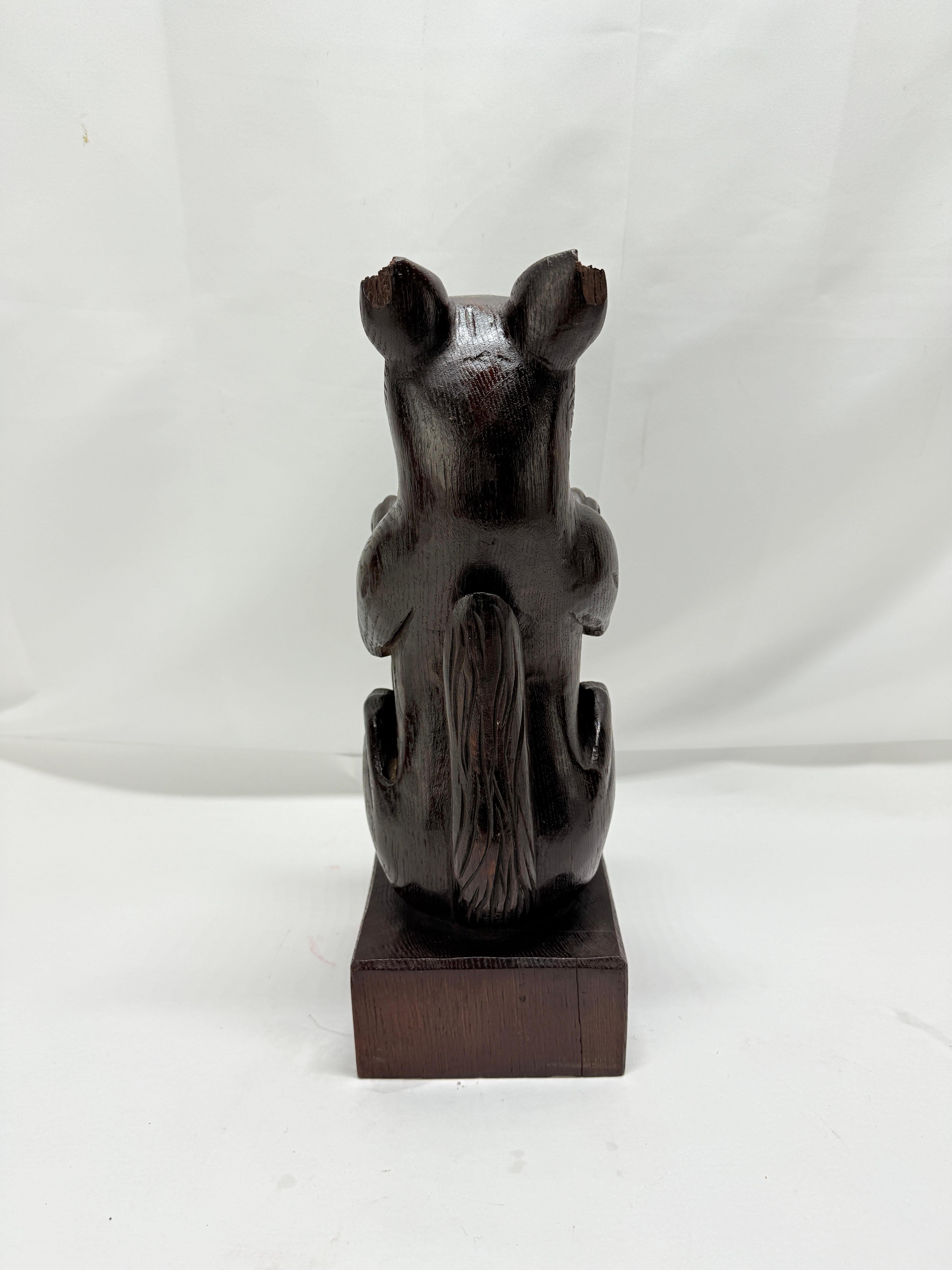 19th Century, Black Forest Carved Oak Newel Post Finial Form of a Dog w/ Shield For Sale 1
