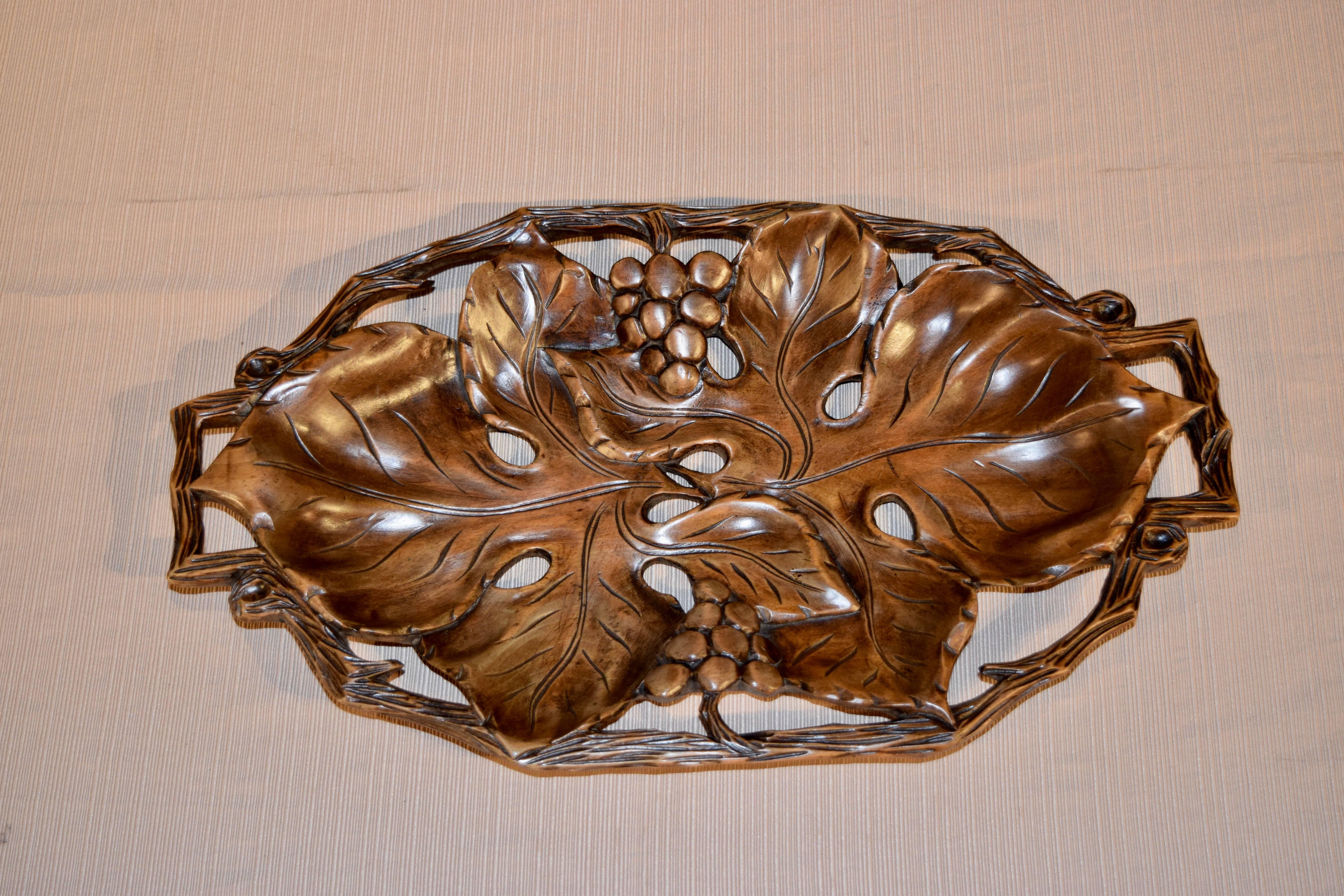 19th century Black Forest hand-carved pierced tray depicting grape leaves, grapes and branches. Wonderful size!