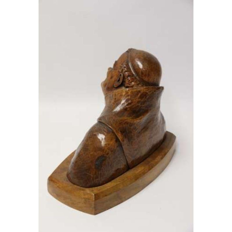 A superb black forest carved walnut study of a monk.

This exceptionally well carved bust of a 19th century monk has been produced out of a single piece of rich dense walnut and then mounted onto a separate walnut plinth, all original. It captures